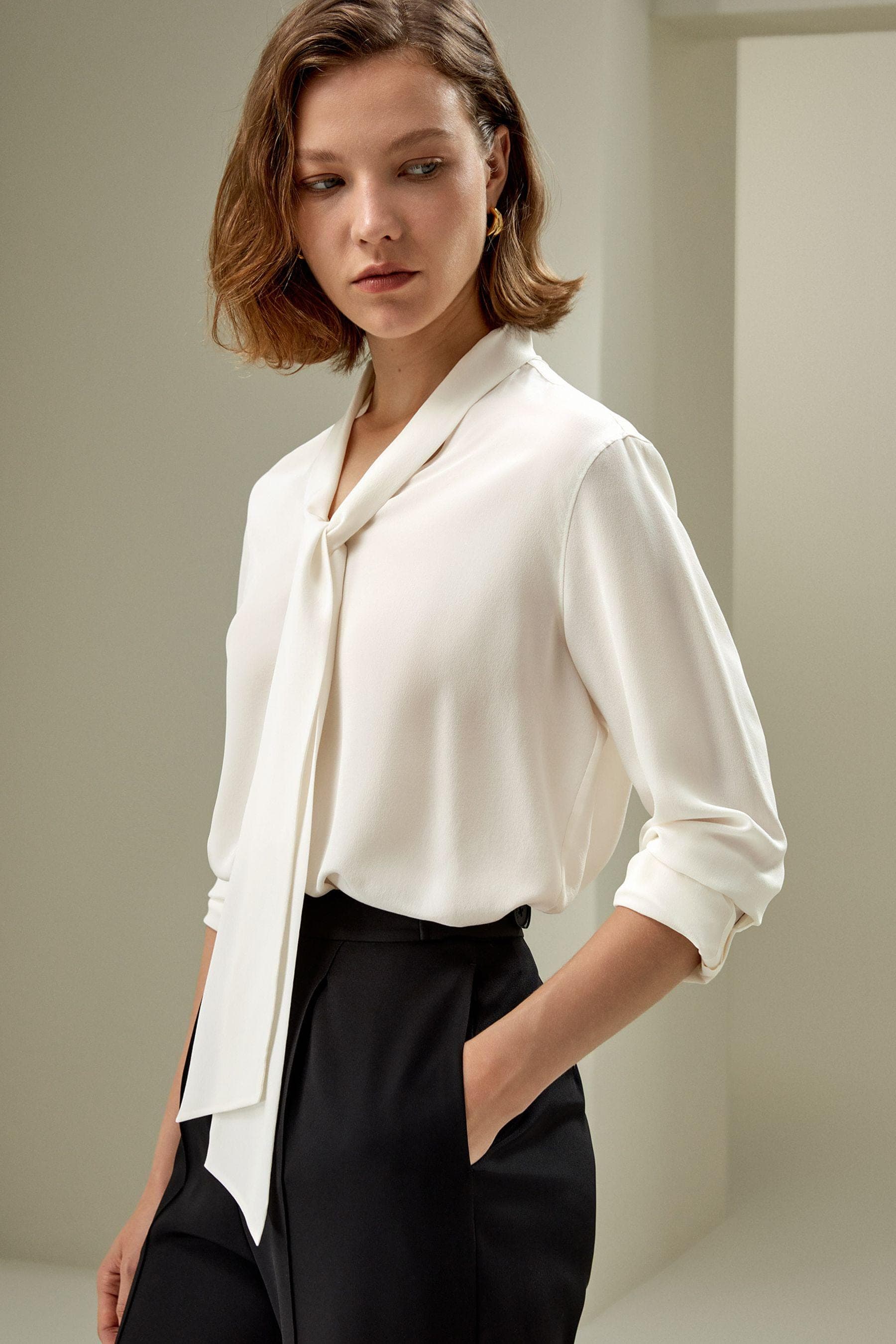 The Crepe Bowtie Blouse exudes elegance with its 100% Crêpe de Chine fabric | Modest Fashion | Tzinut Clothing | Pure Elegance | Custom Made