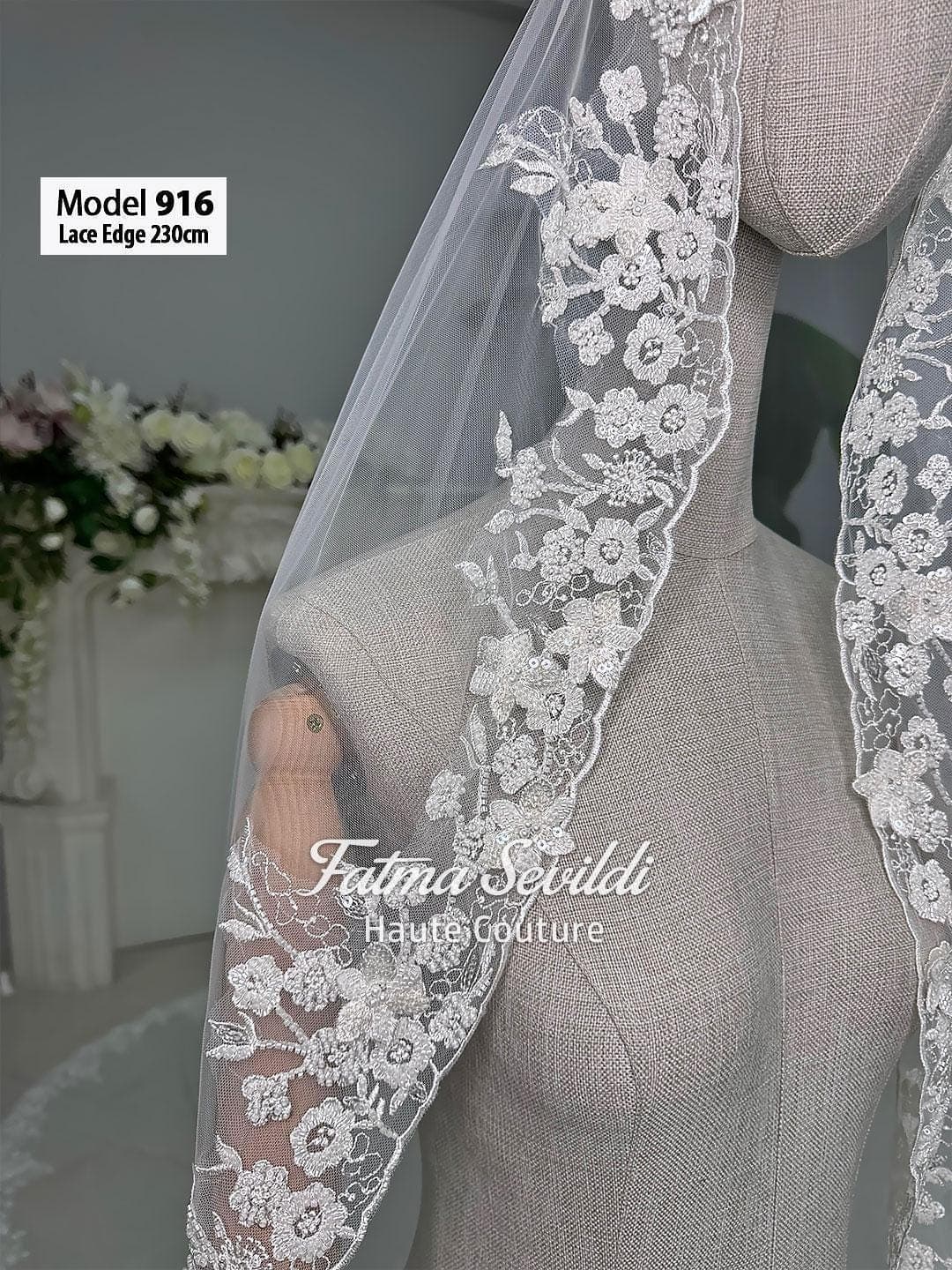 Cathedral lace edge bridal veil in soft ivory luxury tulle with hand-sewn appliqué detail, designed for elegant classic and modest bridal styling. Hijab-friendly long wedding veil with refined lace coverage and a timeless couture finish.