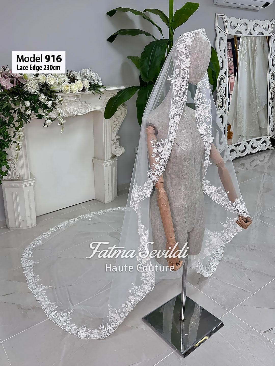Cathedral lace edge bridal veil in soft ivory luxury tulle with hand-sewn appliqué detail, designed for elegant classic and modest bridal styling. Hijab-friendly long wedding veil with refined lace coverage and a timeless couture finish.