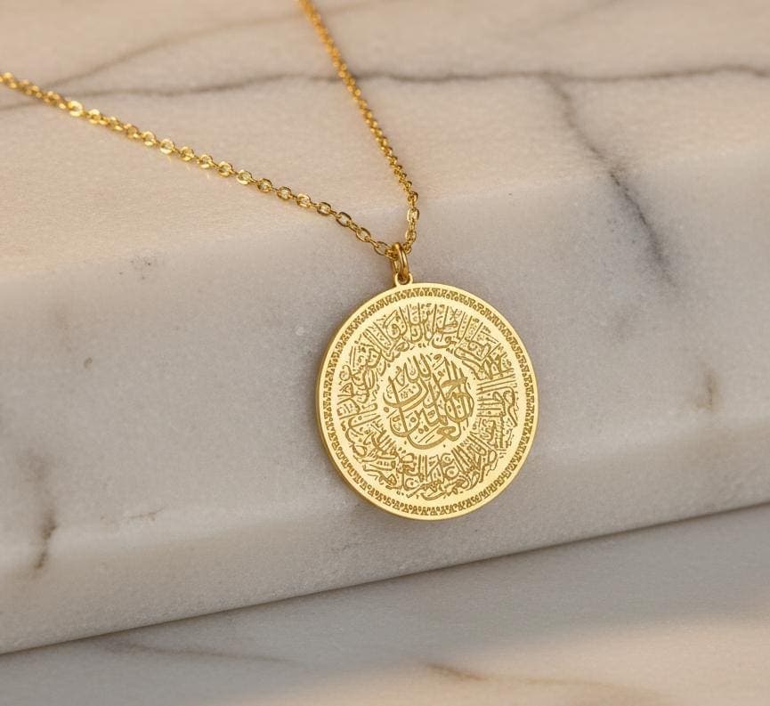 ✨ The Perfect Blend of Faith and Luxury
"Gift a symbol of faith that speaks volumes. Our exquisite Al-Fatiha Necklace features the entire Fatiha Surah, the opening chapter of the Quran, intricately engraved in beautiful Arabic Calligraphy. This is more than just jewelry—it’s a powerful, wearable piece of Islamic Art that serves as a constant reminder of devotion and protection."