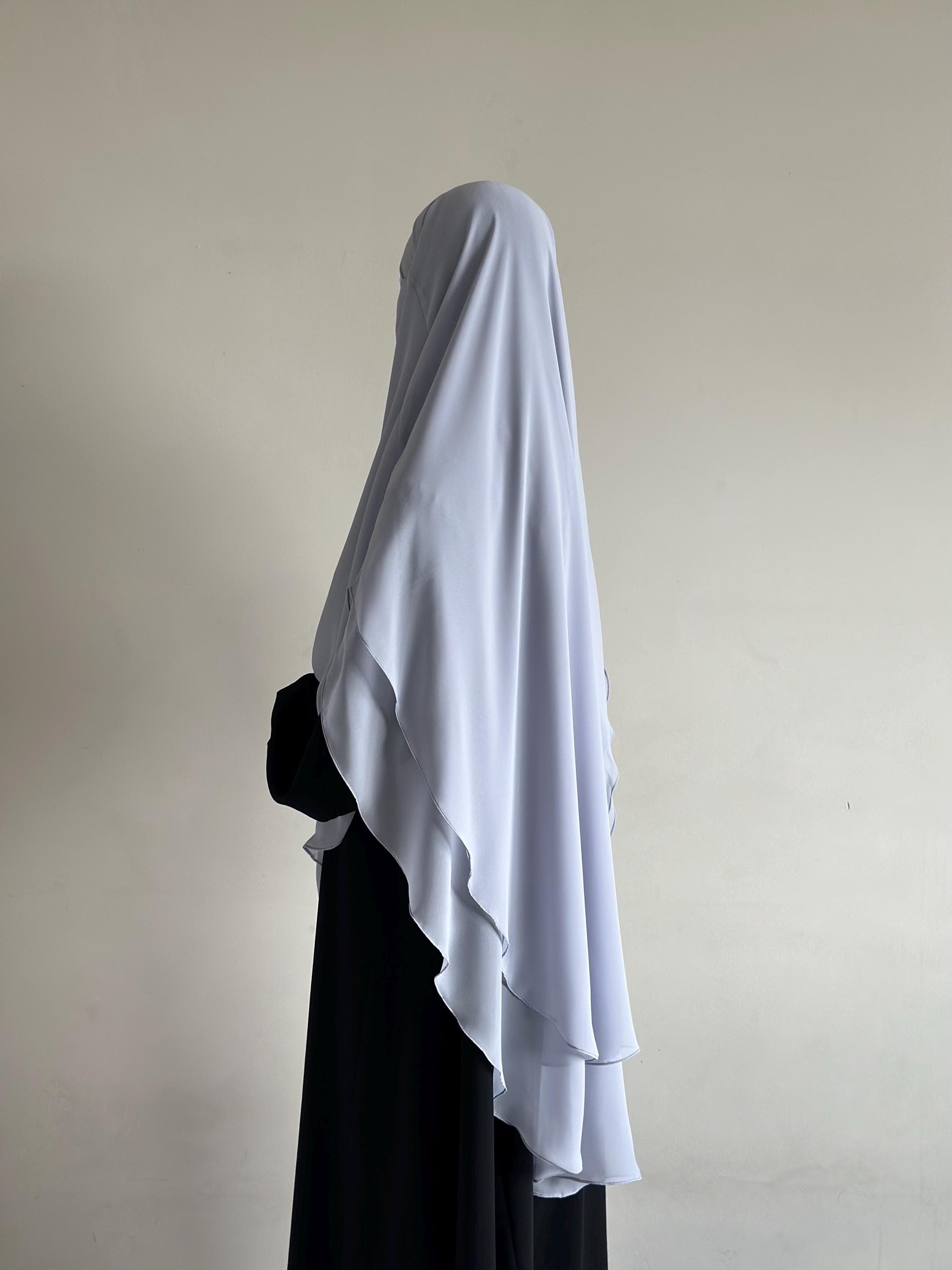Premium 2-layer chiffon khimar available in multiple colors, offering elegance, lightweight comfort, and perfect for modest Islamic fashion