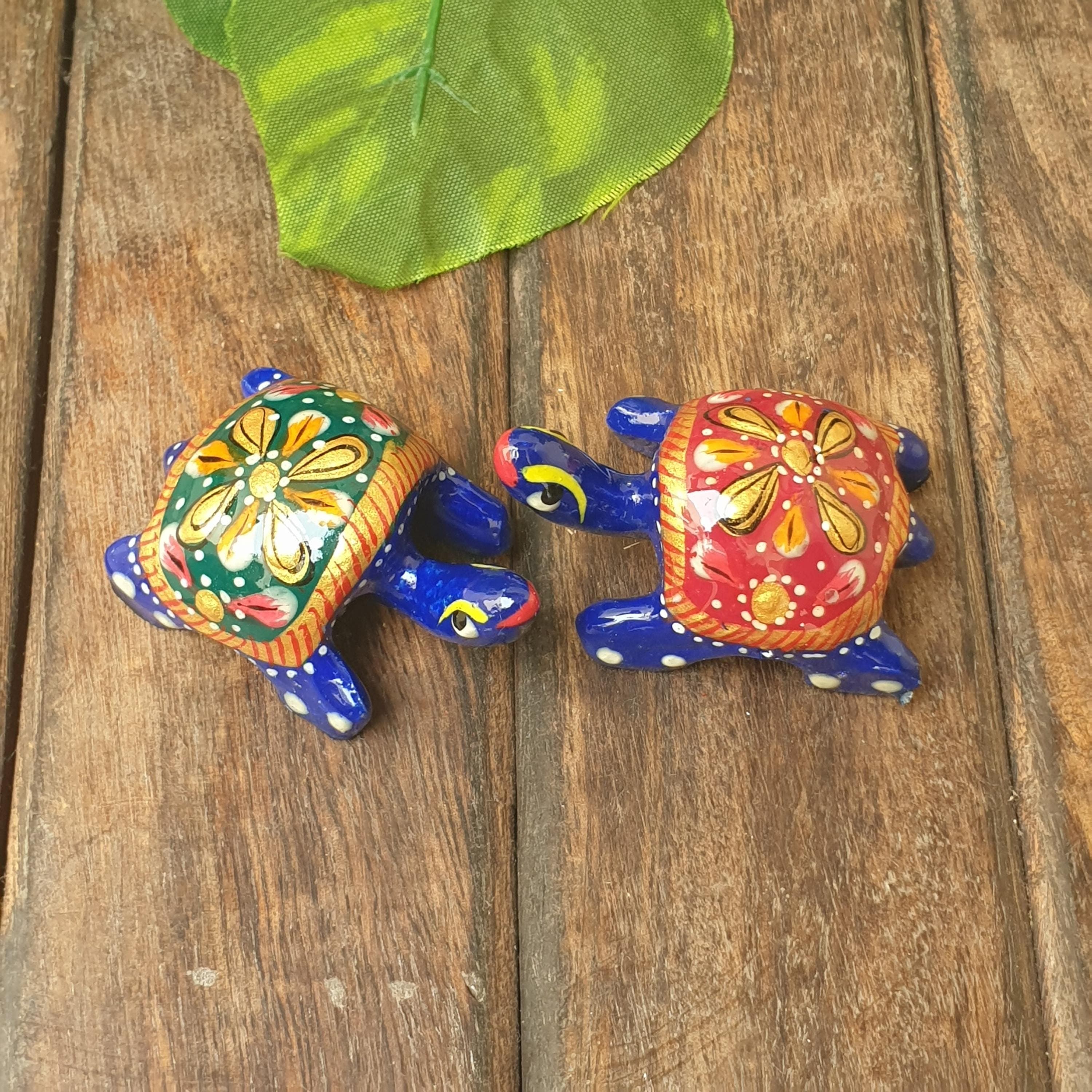 handmade ceramic turtle,
decorative turtle showpiece,
painted turtle figurine,
 lucky turtle home décor,
feng shui turtle for positivity,
ceramic animal figurine,
 turtle gift for home & office,
 positive vibes decor piece,
handmade turtle statue,
ceramic turtle collectible,
 artisan crafted turtle,
spiritual turtle showpiece,
traditional ceramic handicraft,
turtle for good luck & prosperity,
 eco-friendly ceramic home decor,