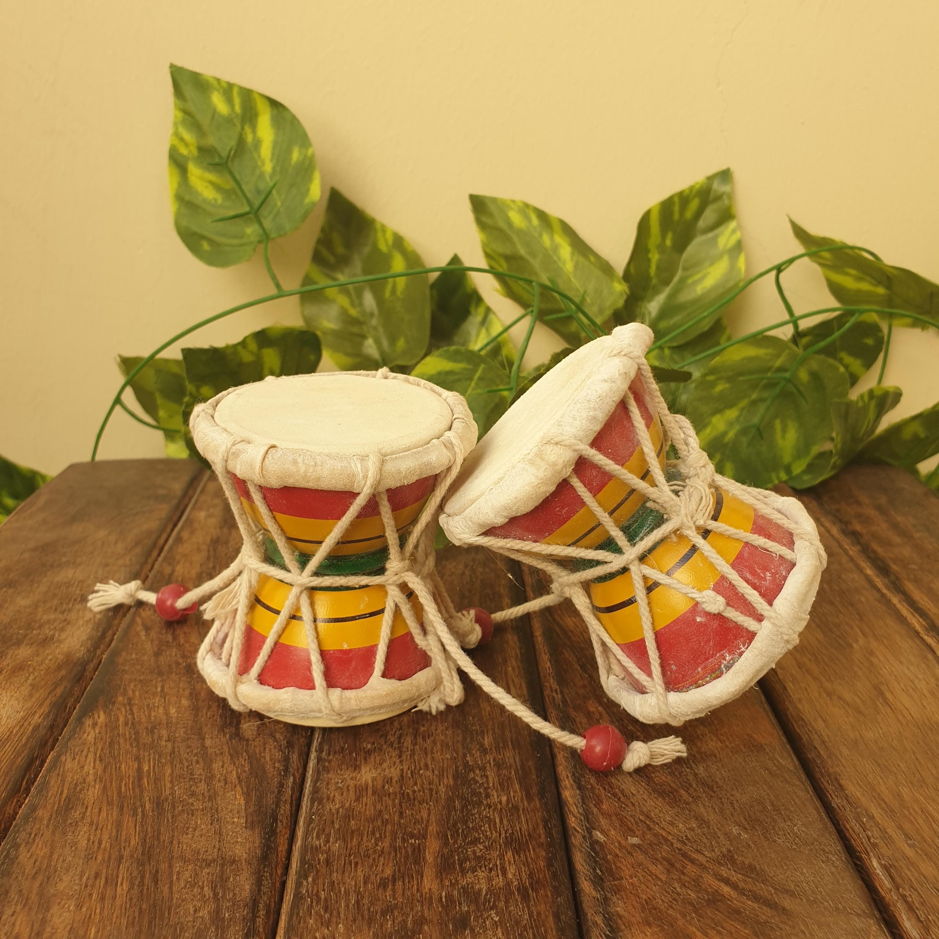damru for shiv puja,
lord shiva musical instrument,
handmade shiva damru,
wooden damru for meditation,
hindu prayer drum,
shiva damru toy,
mahashivratri gift item,
spiritual gift for devotees,
Handmade Wooden Damroo,
Lord Shiva Damru Instrument,
Shiva Prayer Drum,
Painted Wooden Damru,
Hindu Musical Instrument,
Spiritual Prayer Drum,