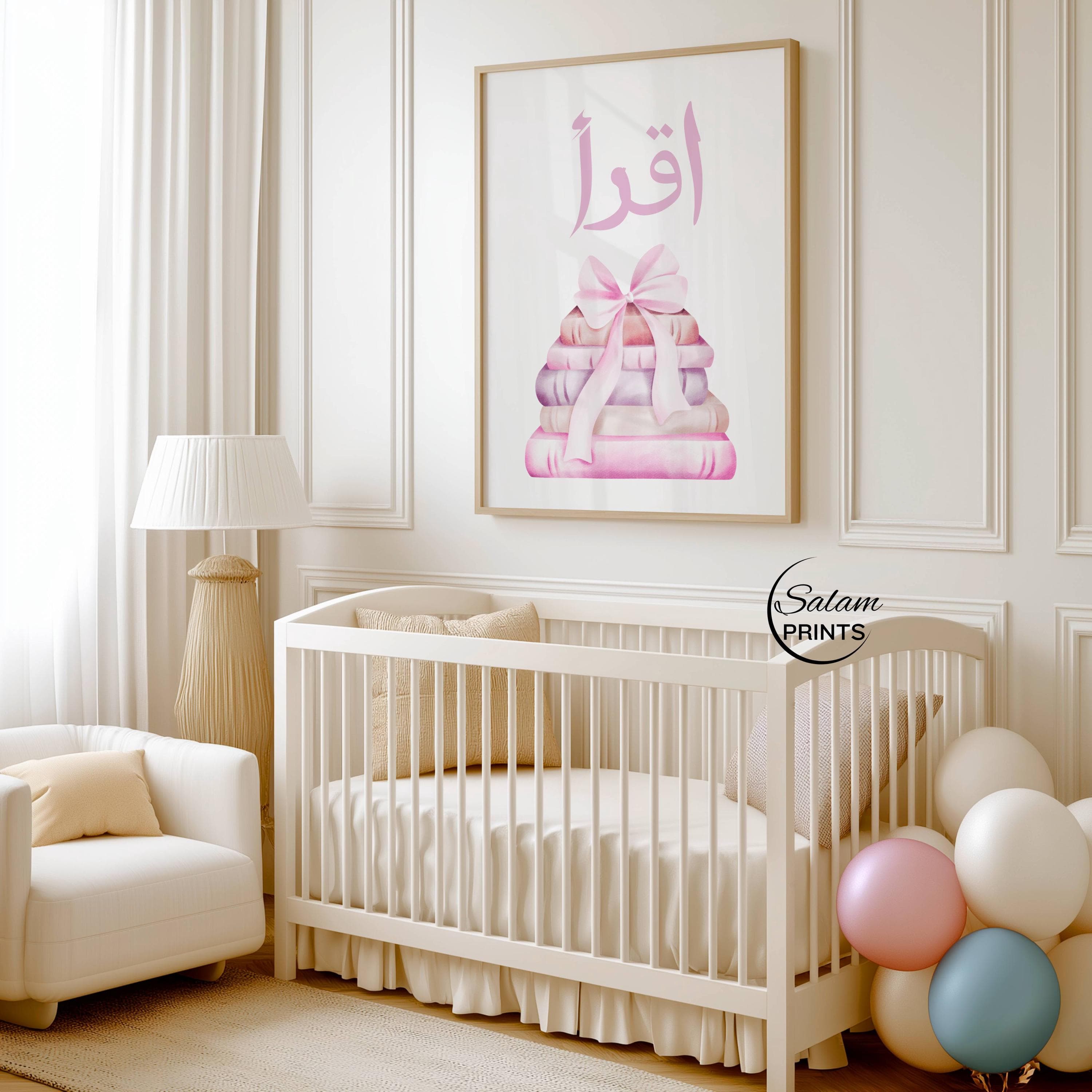 Iqra Islamic wall art printable for kids featuring soft pink bow and stacked books illustration, Quran quote “Iqra” meaning read, perfect for Muslim nursery decor, girls room wall art, Islamic learning poster for study space, baby room decoration, pastel pink nursery print, Eid gift for kids, modern minimalist Islamic home decor, digital download printable art for children’s bedroom or playroom