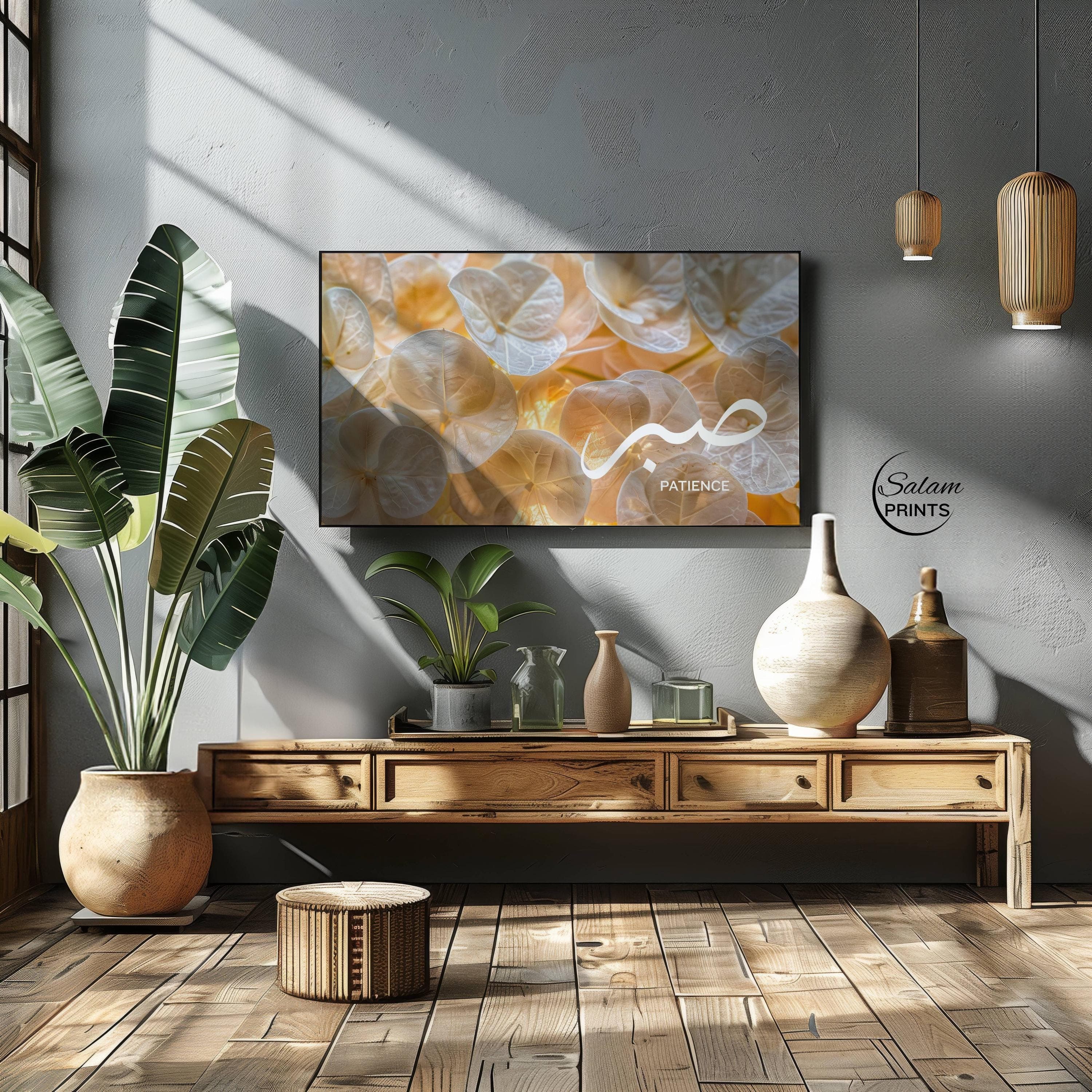 Minimalist Samsung Frame TV wall art featuring a close-up of soft white flowers with the Arabic word “Sabr” beautifully written, creating a calm and elegant Islamic décor aesthetic.