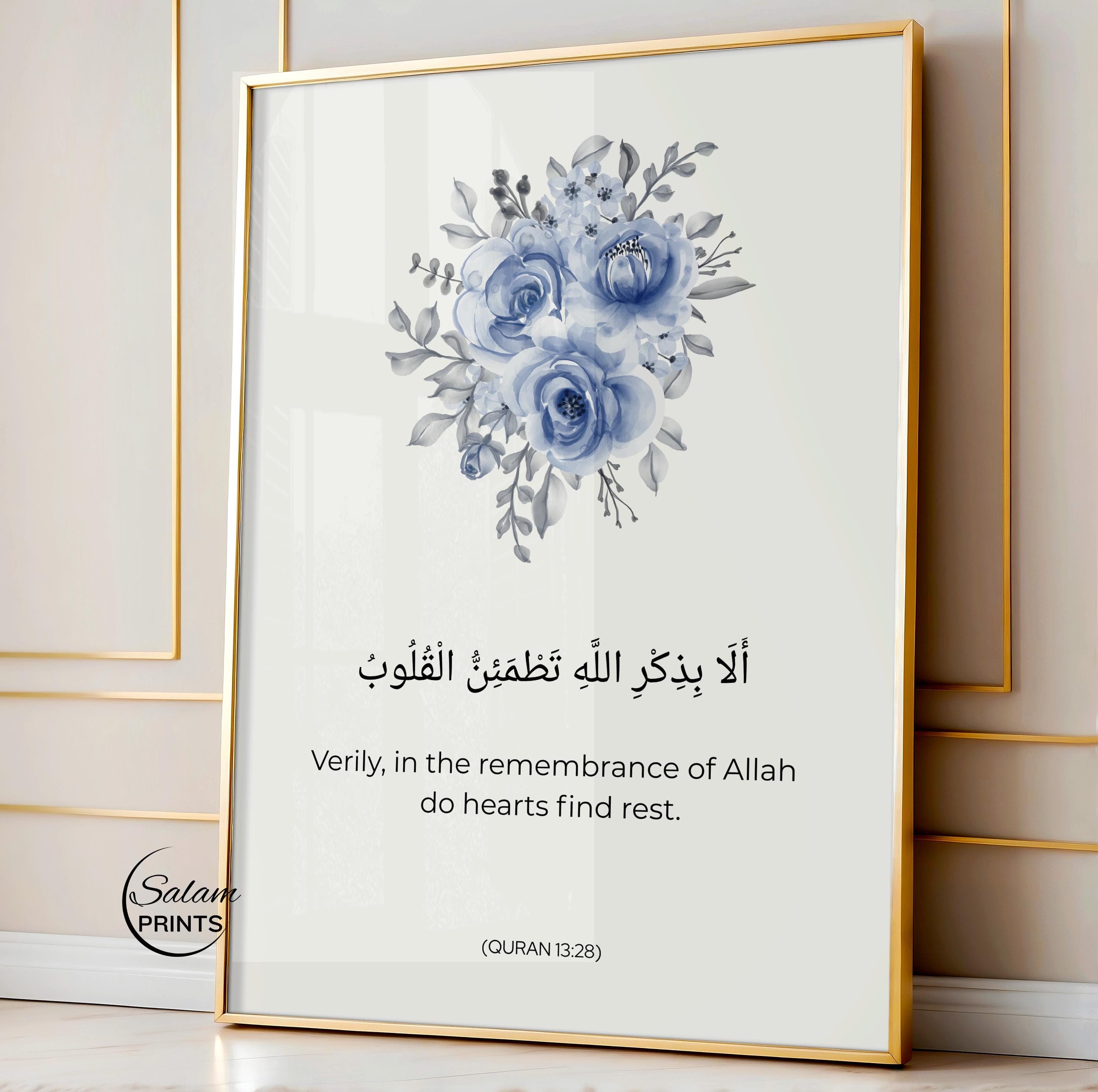 QURAN QUOTE ART , Minimalist WATERCOLOR FLOWERs IN blue on white background , BELOW IT IS WRITTEN QURAN VERSE - '' Verily in the remembrance of Allah do heart find rest.'' IN ARABIC CALLIGRAPHY AND ENGLISH TRANSLATION.