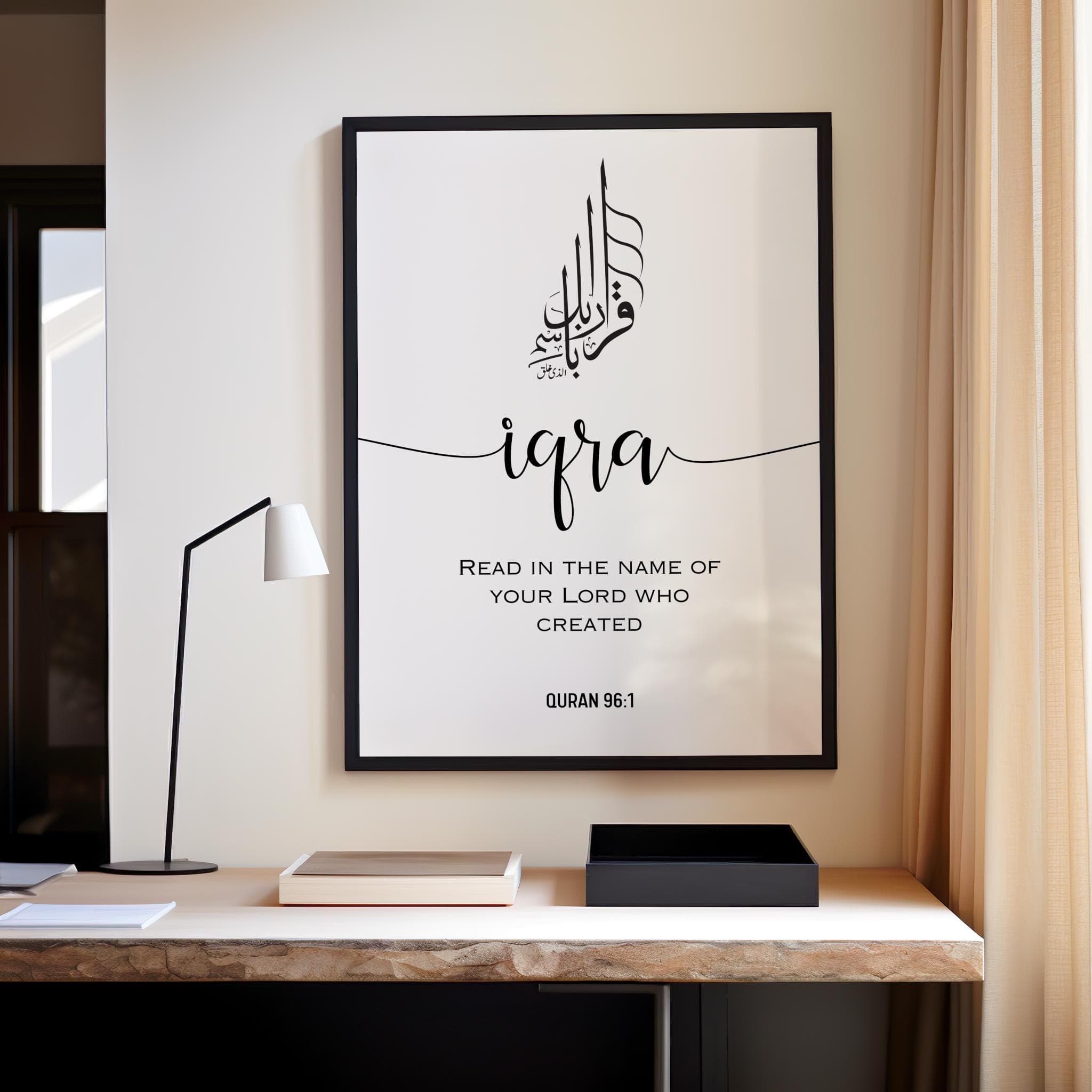 Minimalist Arabic calligraphy featuring the Quranic verse IQRA ;Read in the name of your Lord who created(Quran 96:1) in an elegant black-and-white design. Below it is written the full verse translation in engl;ish in capital easy to read letters this modern elegant fonts decor adds a modern touch, making it perfect for a study, prayer room, or living space. This Islamic digital download is ideal for Muslim home decor, Quran-inspired art, and unique Islamic gifts, bringing faith into any space.