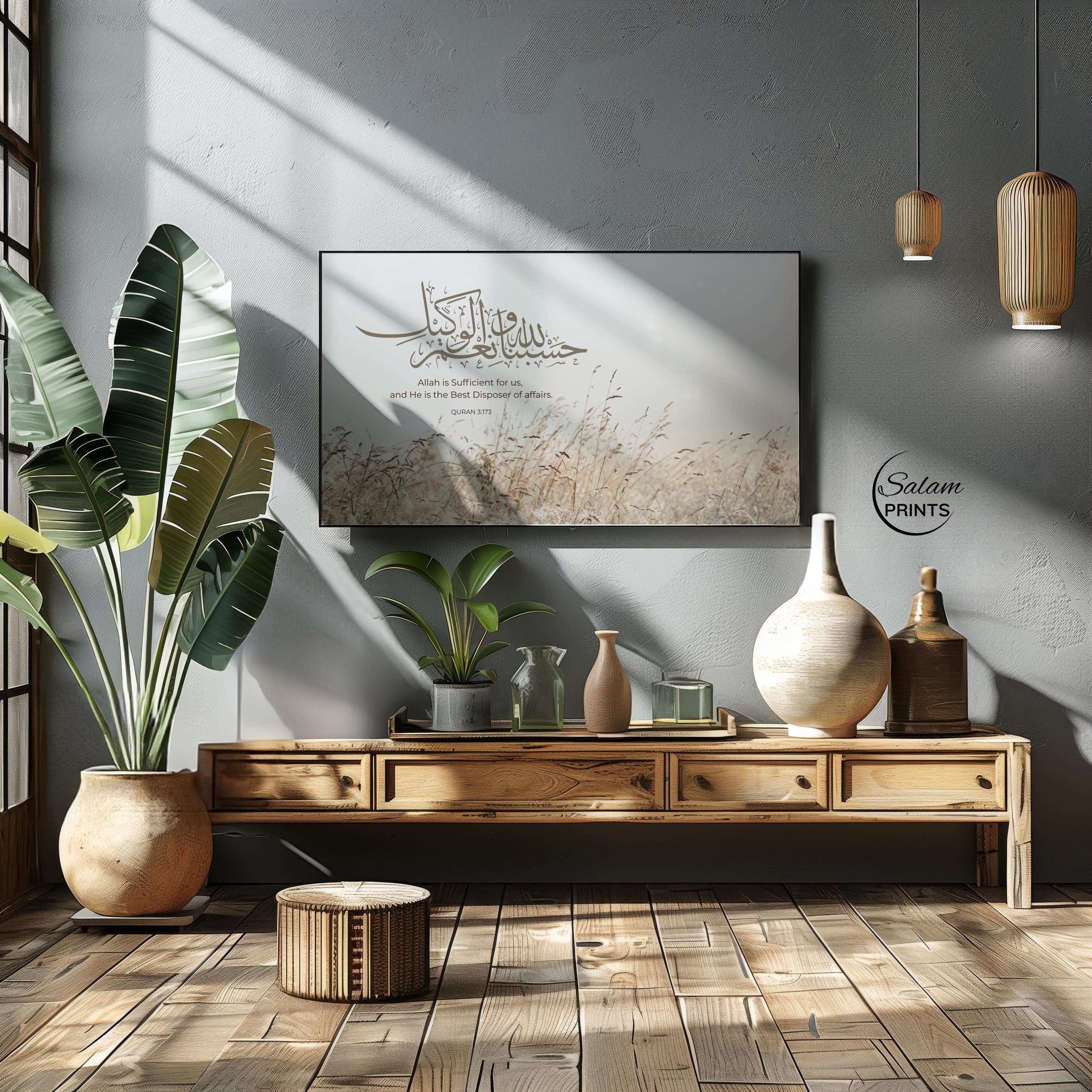 Samsung islamic smart tv Neutral beige in color with pampas grass beige in colour wildgrass, at bottom and quran verse hasbunallahu wa naimal wakeel written in arabic calligraphy with english translation.