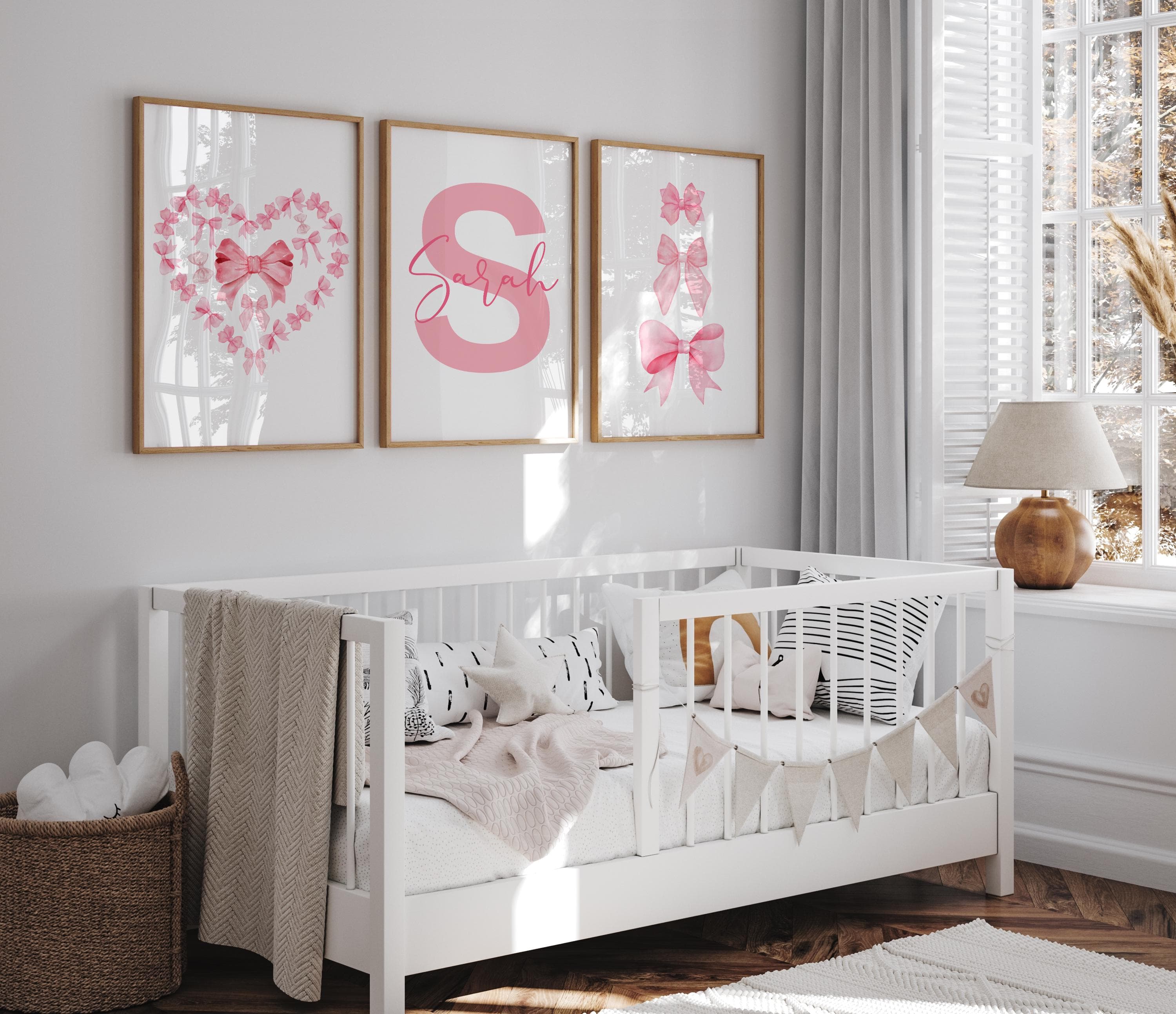 Adorable pink bow nursery decor for modern kids' spaces.