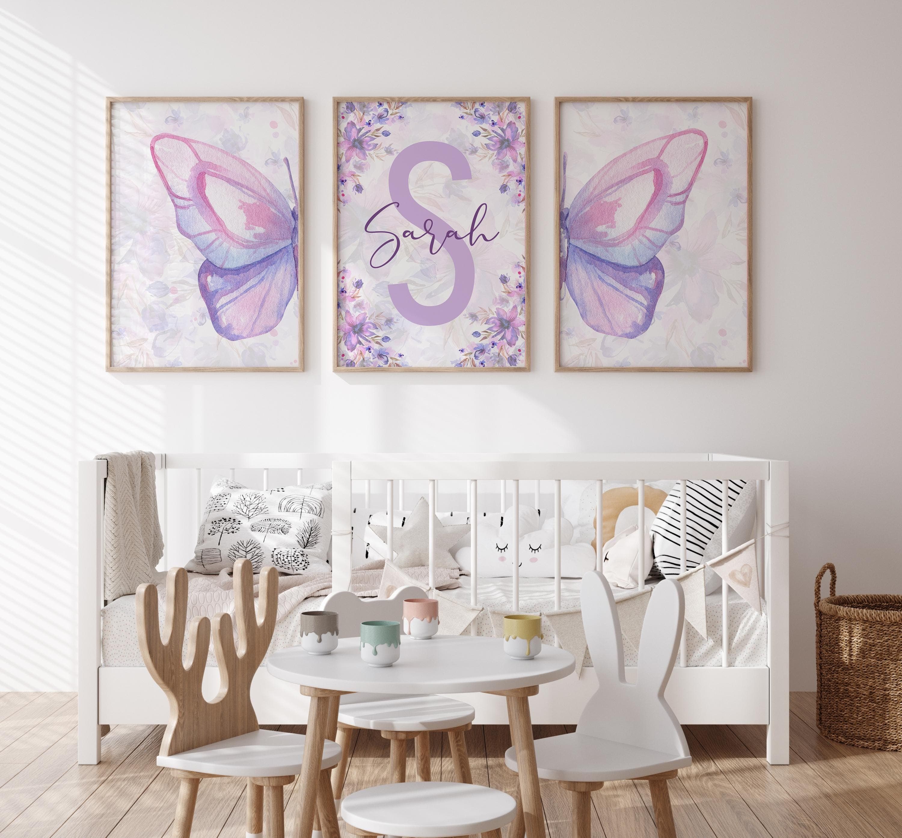 Custom name artwork featuring dreamy purple butterflies.