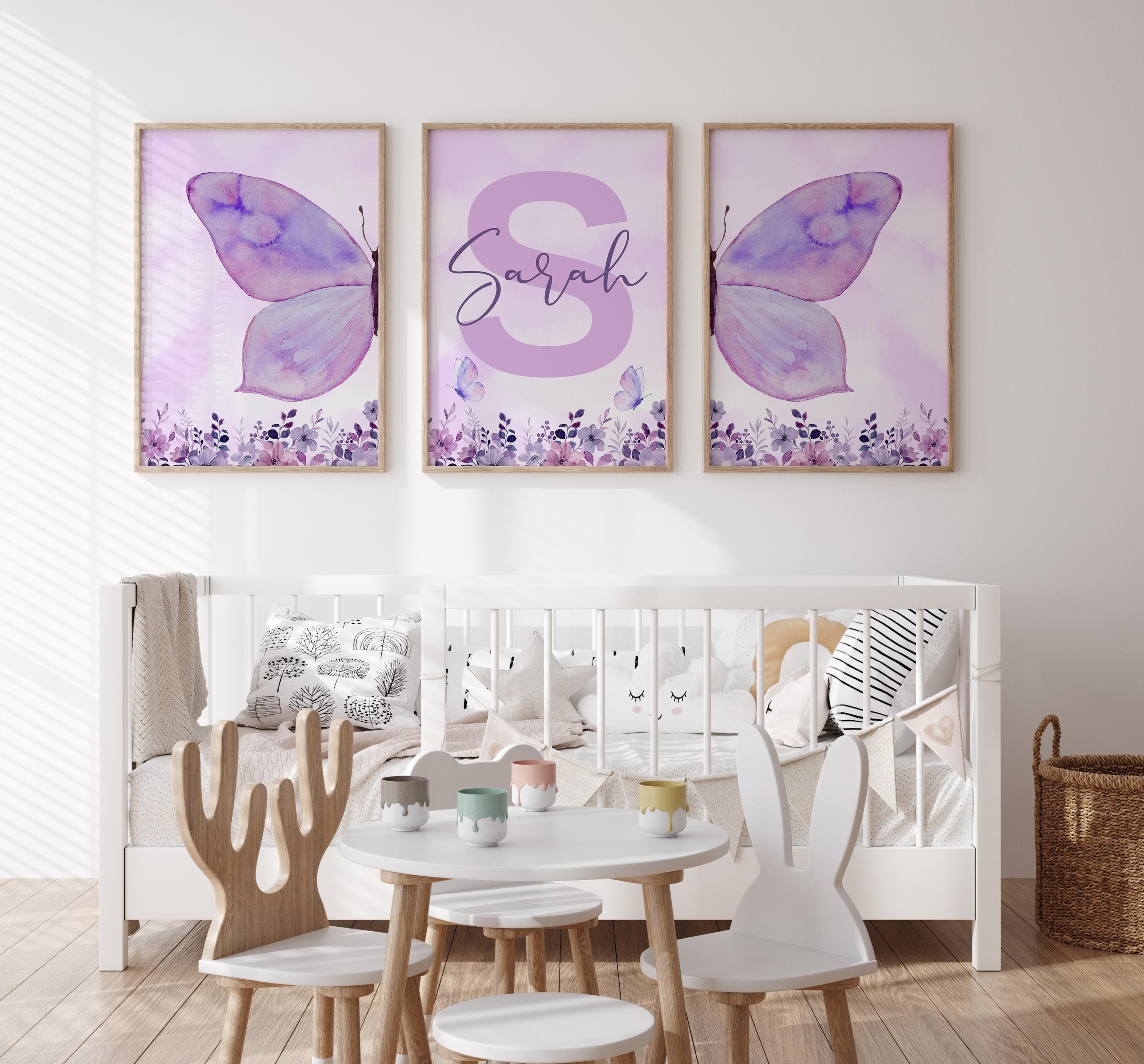 Customizable purple nursery wall art with butterflies.
