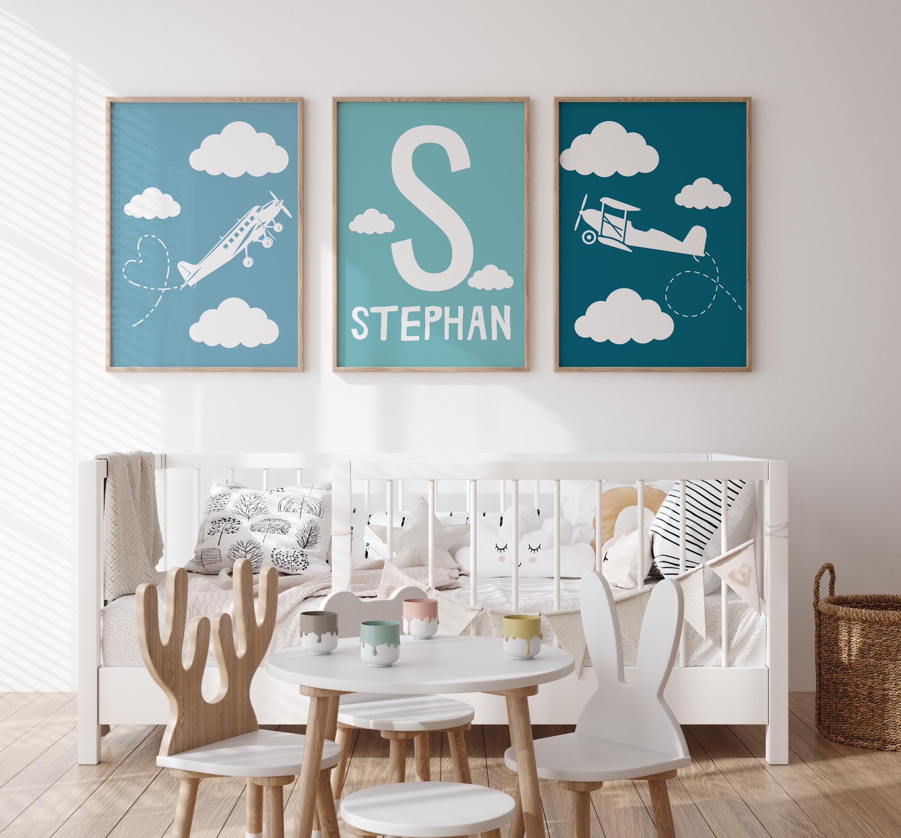Personalized airplane nursery decor with child’s name.