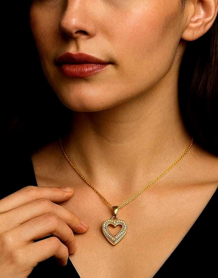 AI Model showing the Designer Necklace by JETTE, 925 Sterling Silver, Gold-Plated, Double Heart Pendant with Cubic Zirconia