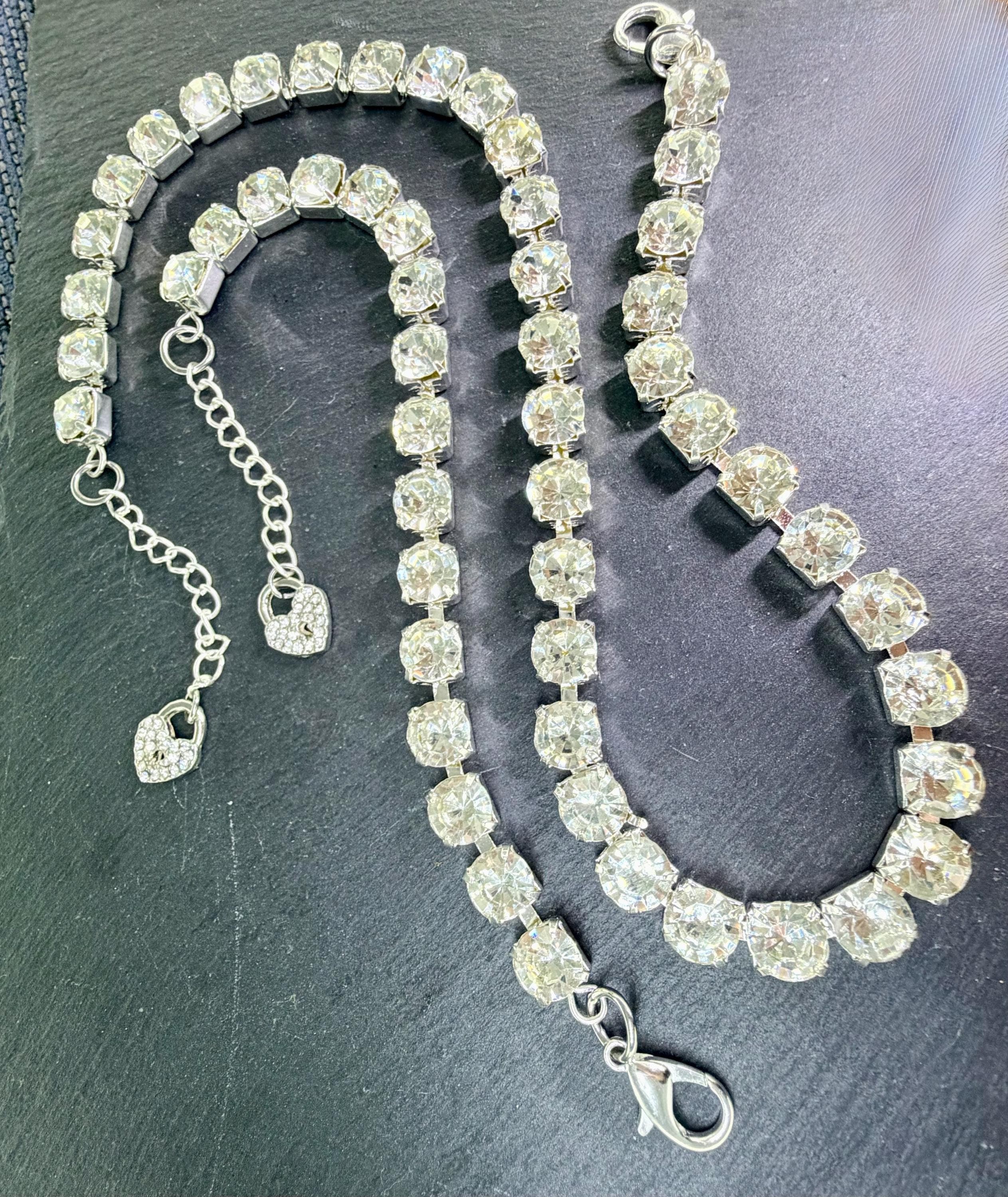 Matching necklace and bracelet laid flat to show length