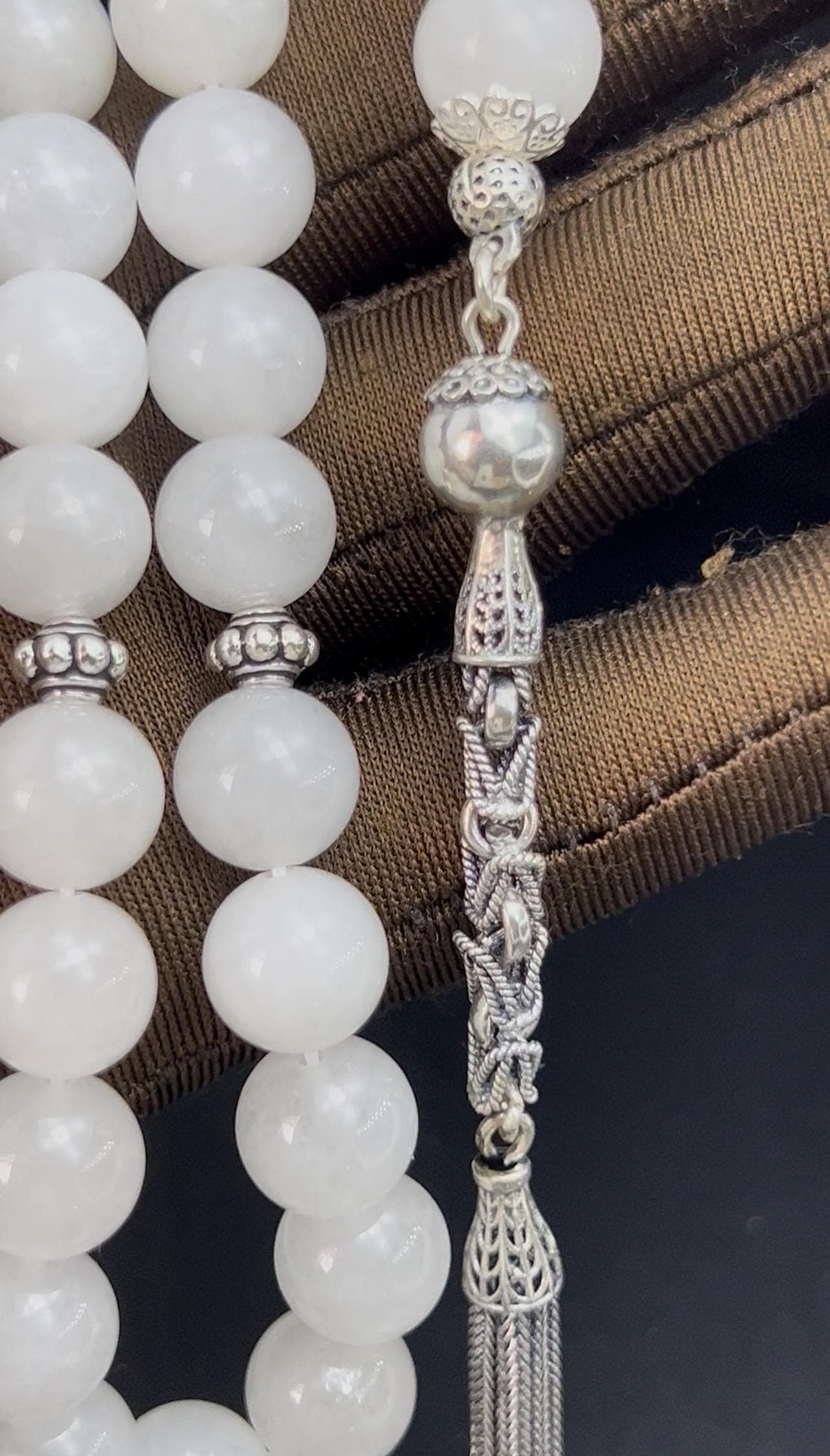 White Jade Tasbih, 925 Sterling Silver Tassel. Elegant prayer beads made of natural stone, perfect for meditation, energy balance, or as a thoughtful Islamic gift. Featuring artisan filigree crafted silver details