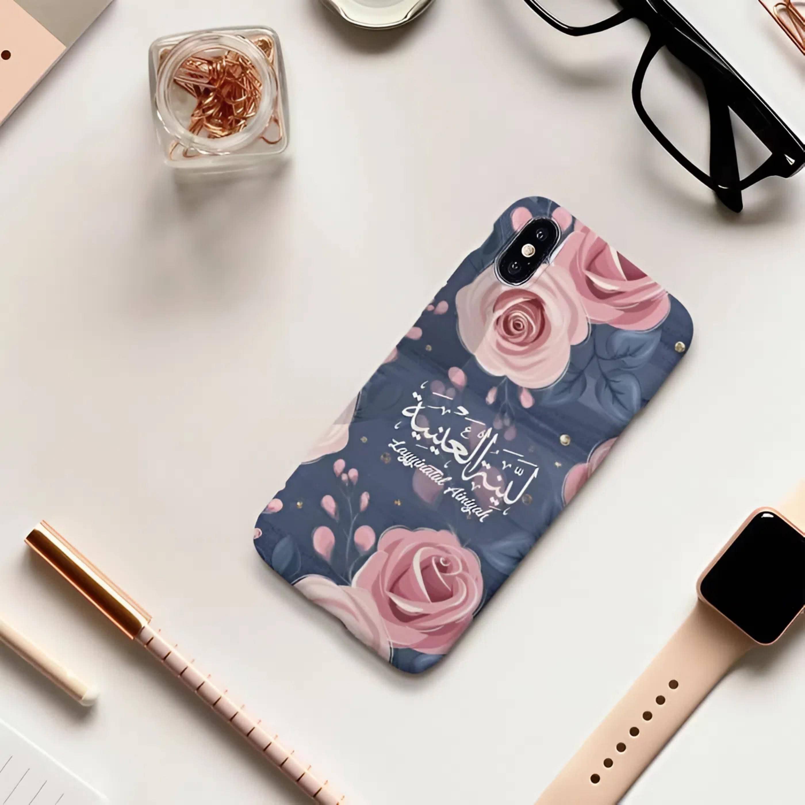Personalized phone cases featuring detailed Arabic calligraphy, floral patterns, and historical architectural motifs in various finishes like matte black and clear.