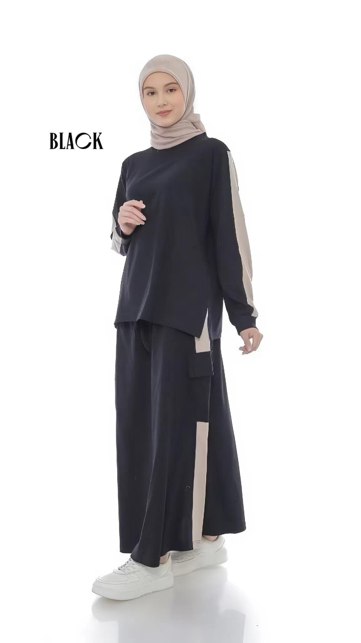 Two-piece modest cotton outfit with long-sleeve top and maxi skirt in taupe, worn by a woman standing against a white background.