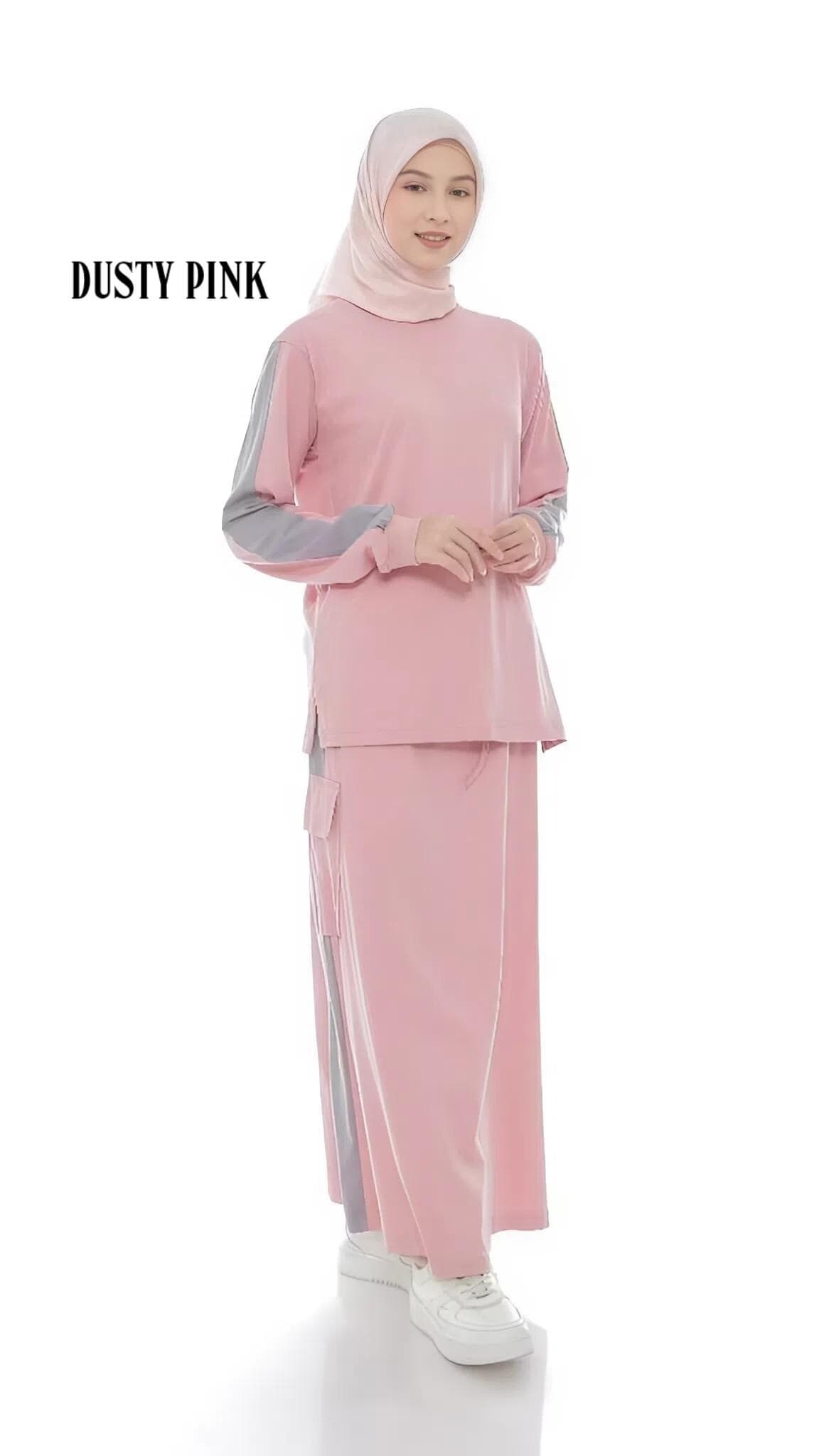Two-piece modest cotton outfit with long-sleeve top and maxi skirt in taupe, worn by a woman standing against a white background.