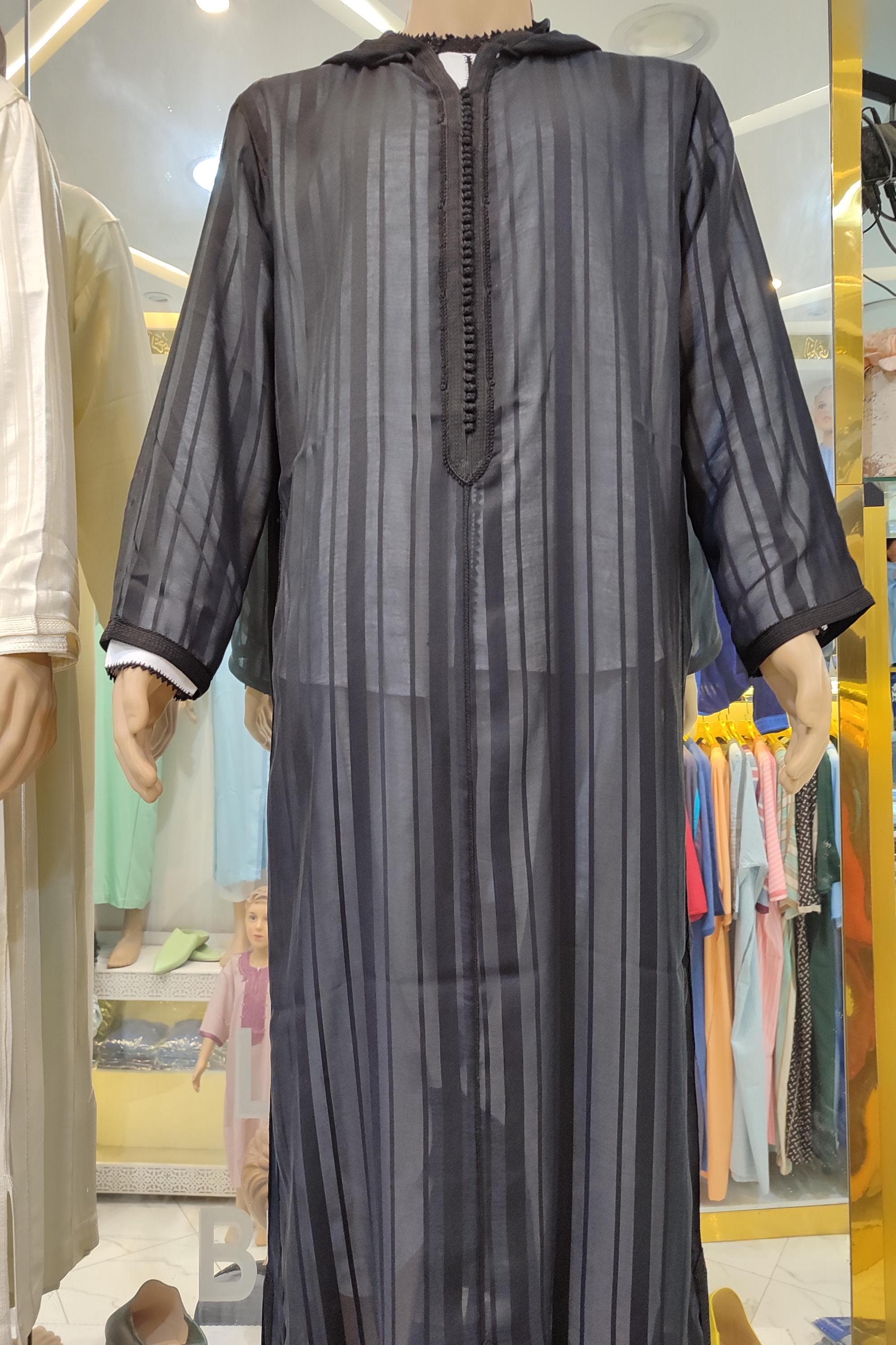 Experience ultimate comfort in this authentic wool jalabiya men, a perfect fusion of traditional craftsmanship and modern style. This wool thobe jubba is ideal for prayer as a prayer jubbah or formal occasions. The djellaba Moroccan design features hand-stitched details and premium wool fabric, ensuring warmth and breathability. Whether worn as a jubba for men for religious events or as elegant daily wear, this Moroccan jabador offers unmatched quality and cultural authenticity.