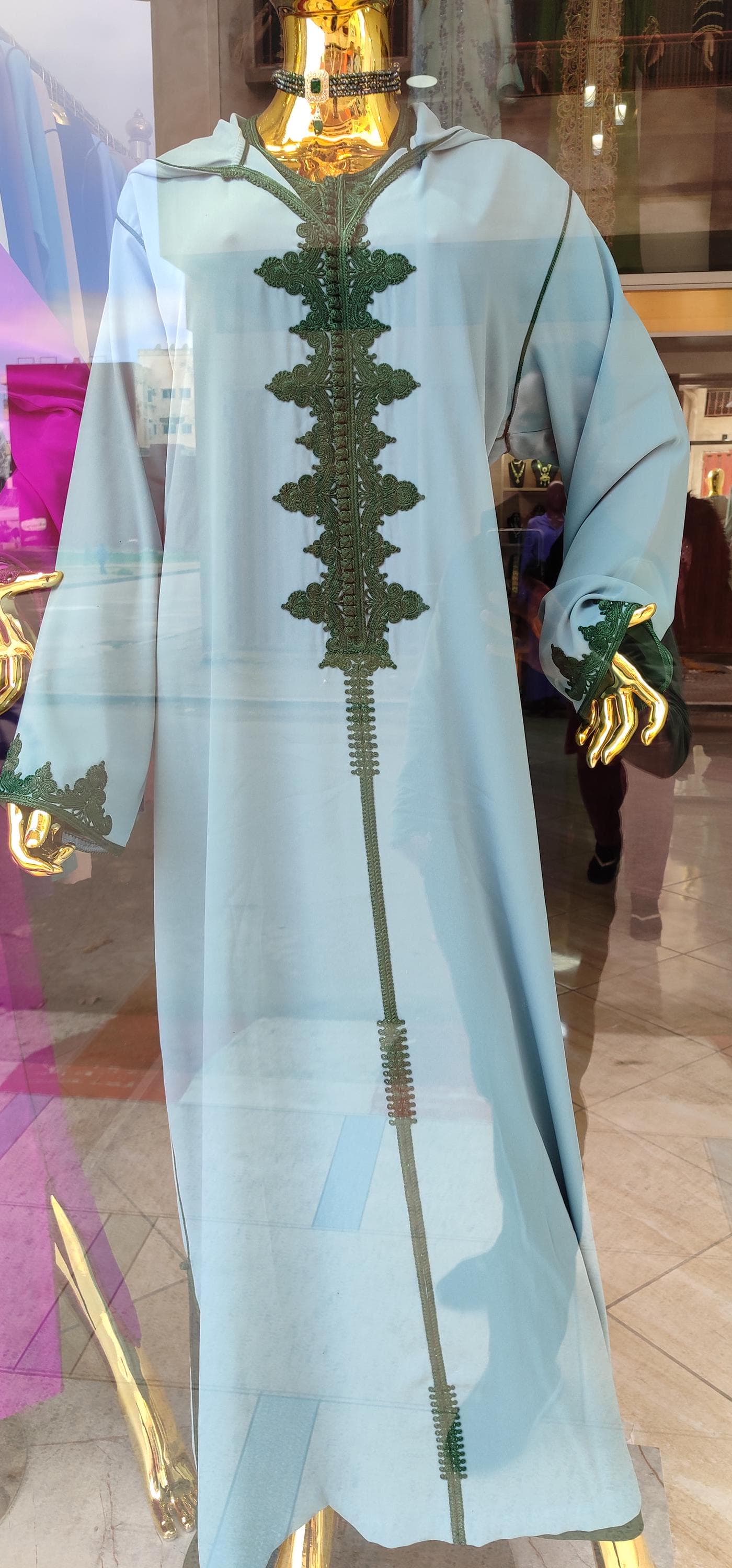 Embrace the charm of Moroccan fashion with this stunning Djellaba, an elegant mix of modesty and luxury. Designed for Ramadan 2025, Eid, and Nikah celebrations, this embroidered gandoura is a timeless piece. A perfect Arabic gift or maternity/birthday outfit, blending traditional craftsmanship with modern trends.