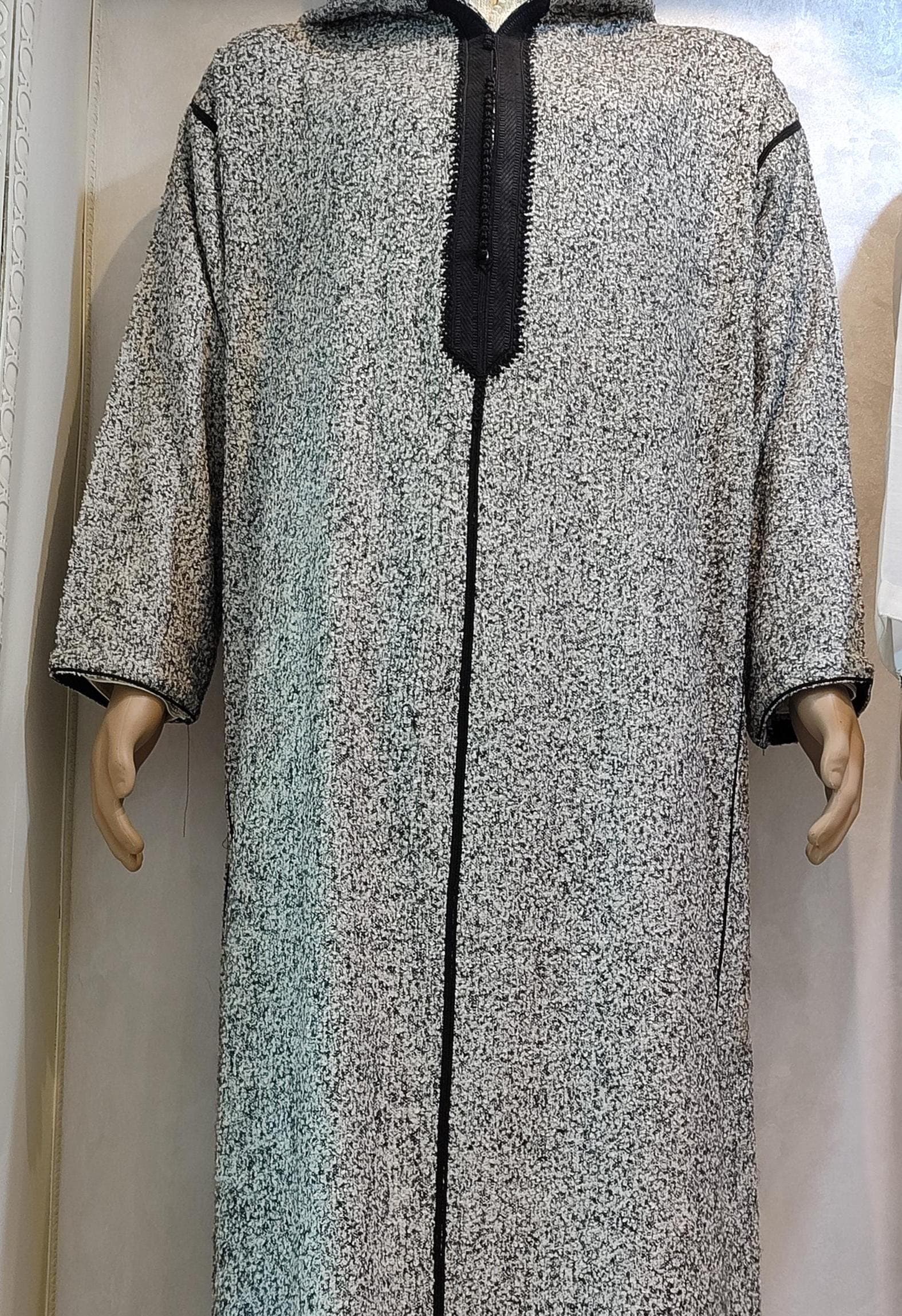 Elevate your wardrobe with this exquisite Moroccan kaftan, a stunning kaftan long dress perfect for special occasions. This handmade djellaba dress blends traditional Moroccan artisan techniques with modern bohemian style. Made from premium fabrics, this kaftan dress works as elegant loungewear or a statement Ramadan dress. Ideal for women seeking unique African dress styles with authentic Moroccan fashion heritage.