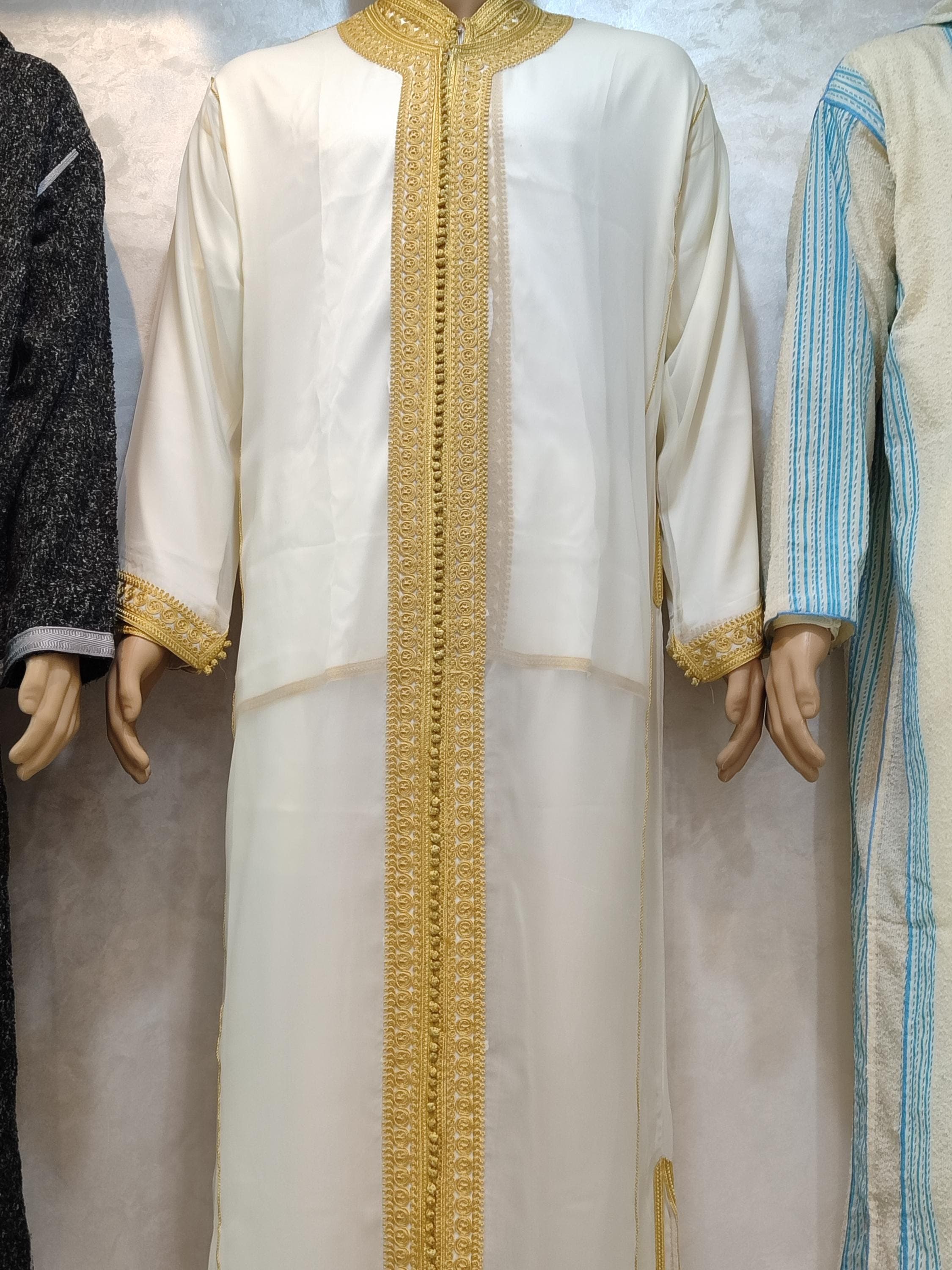 Celebrate love and heritage in style with this luxurious marriage jabador. Whether you're attending a henna night, a Nikah ceremony, or a traditional Moroccan wedding, this finely detailed jabador homme brings authenticity and grace. Inspired by African jabador fashion and Moroccan craftsmanship, it also pairs beautifully with wedding kaftan pieces for a complete groom’s outfit.