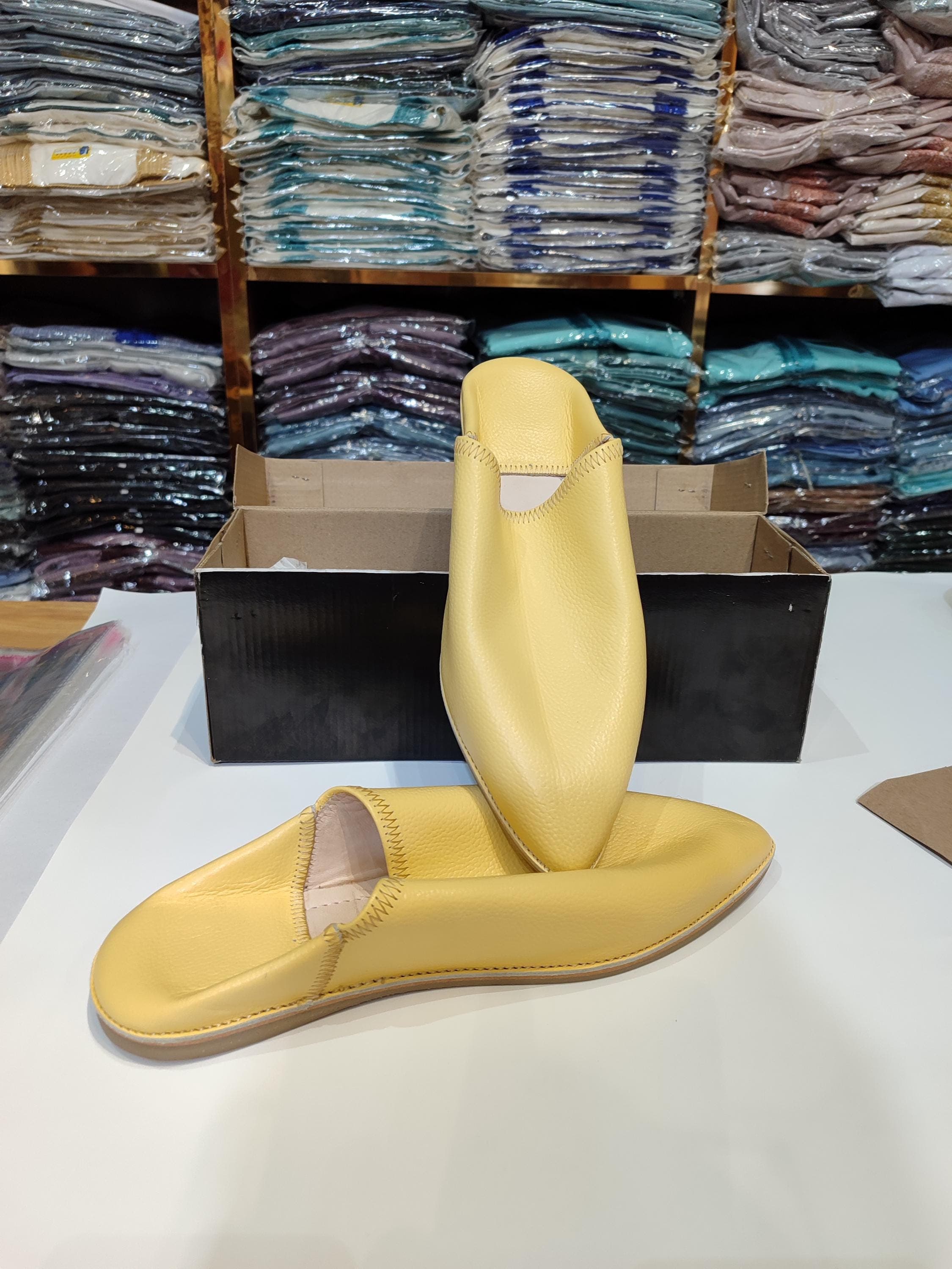 Experience ultimate comfort with our handmade slippers, crafted from supple organic leather. These Moroccan mules, known as babouche slippers, are a timeless piece of traditional craftsmanship. The buttery-soft leather molds to your feet, making them the perfect house slippers for everyday luxury. The minimalist design, featuring a classic pointed toe, offers a sophisticated slip-on style. A truly thoughtful and practical gift for him that embodies quality and artisan heritage.