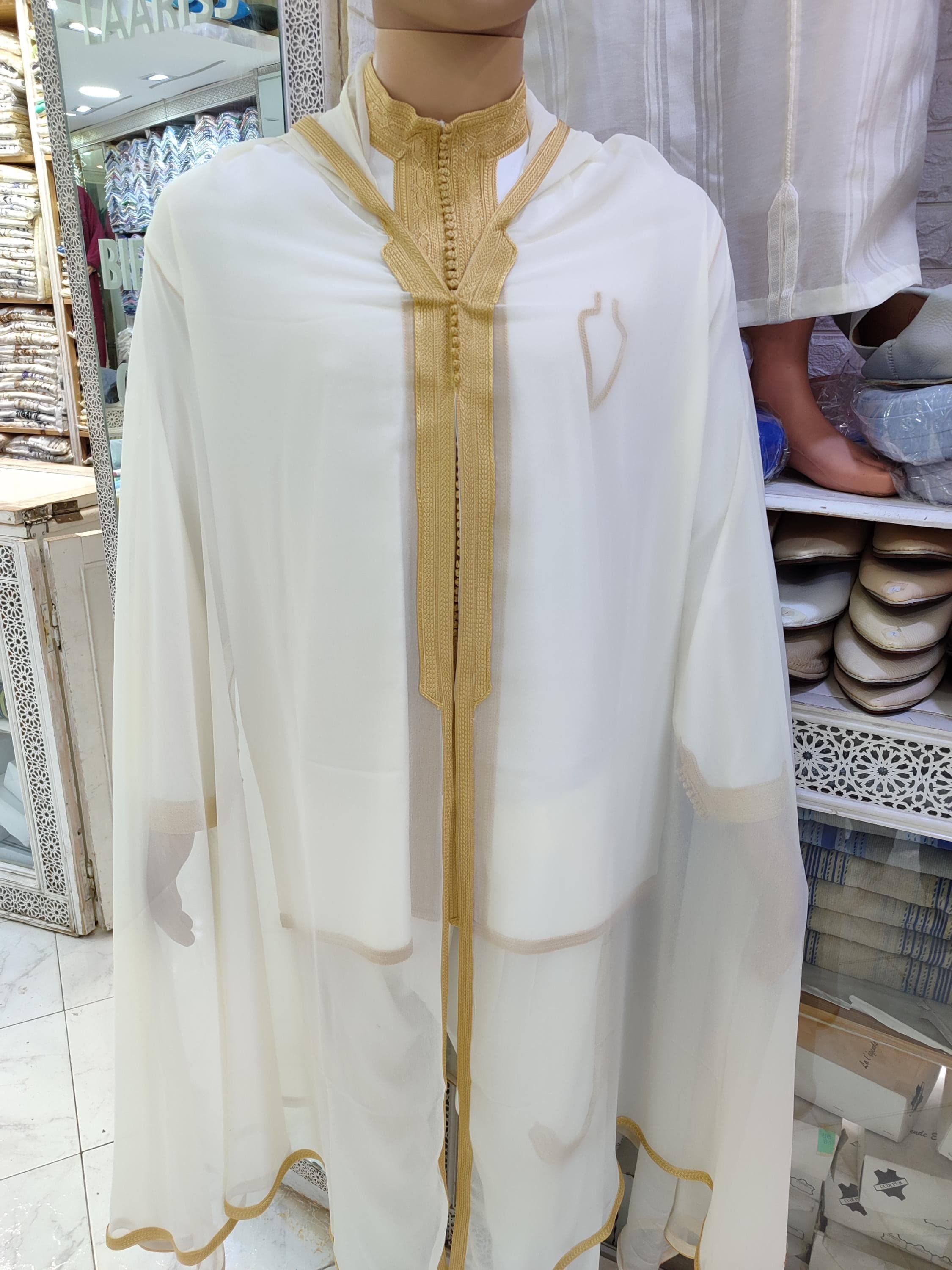 Experience unparalleled craftsmanship with this handmade Moroccan kaftan men set. Designed for the modern groom who values tradition, this jabador men outfit is a perfect choice for a Moroccan wedding men celebration. The exquisite detailing and premium fabric make it a standout groom outfit for your nikah or henna night. This 3 piece kaftan set is not just clothing; it's a piece of cultural art, making it an essential part of Islamic men clothes for special occasions.
