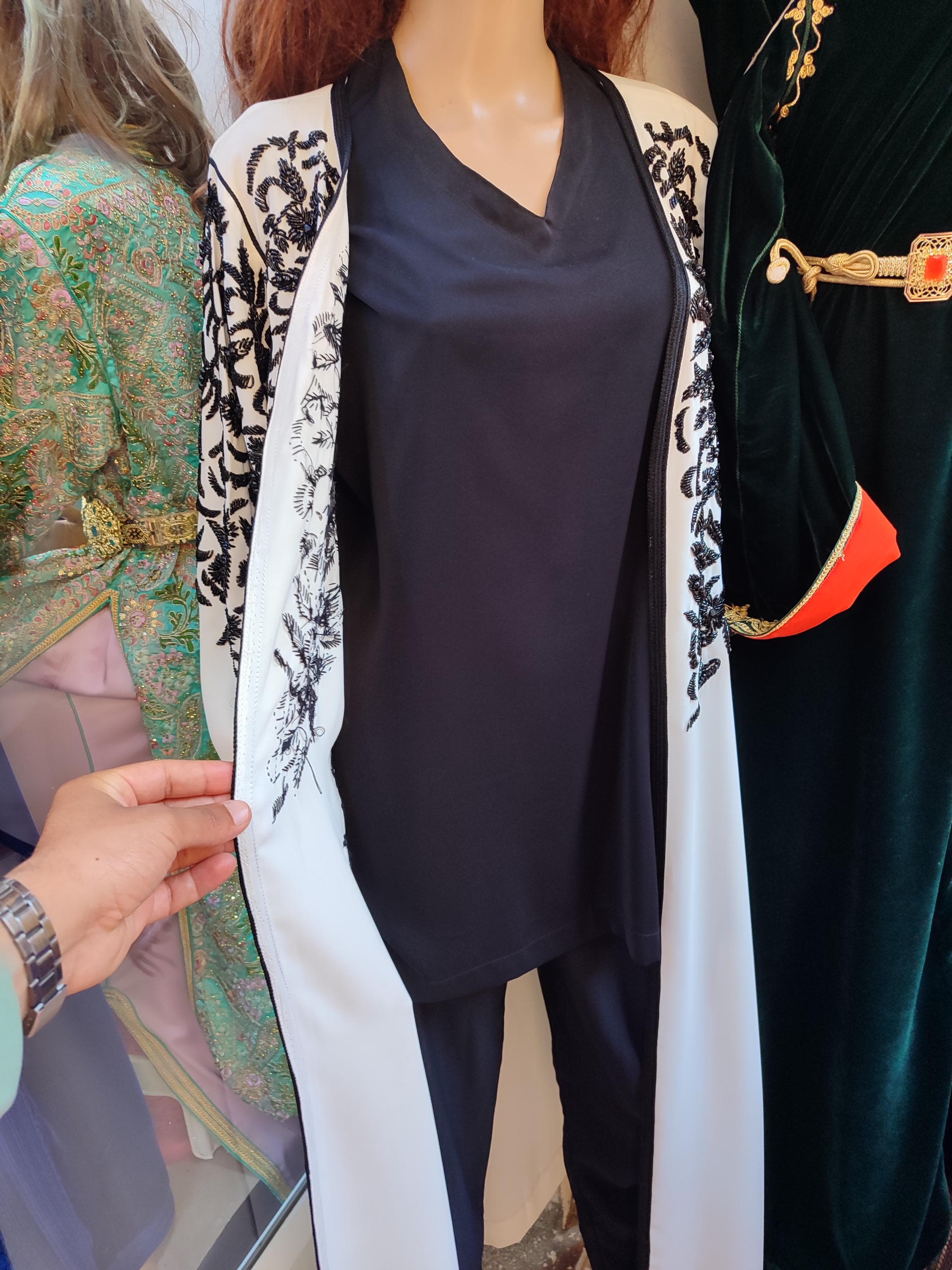 Elevate your special day with our luxurious djellaba for wedding collection, where fancy kaftan designs meet ceremonial elegance. These wedding abaya creations feature premium materials and elaborate embroidery techniques passed down through generations of Moroccan artisans. Our caftan djellaba wedding ensembles incorporate traditional arabic islamic dress elements while introducing contemporary silhouettes and embellishments that make each piece truly extraordinary.