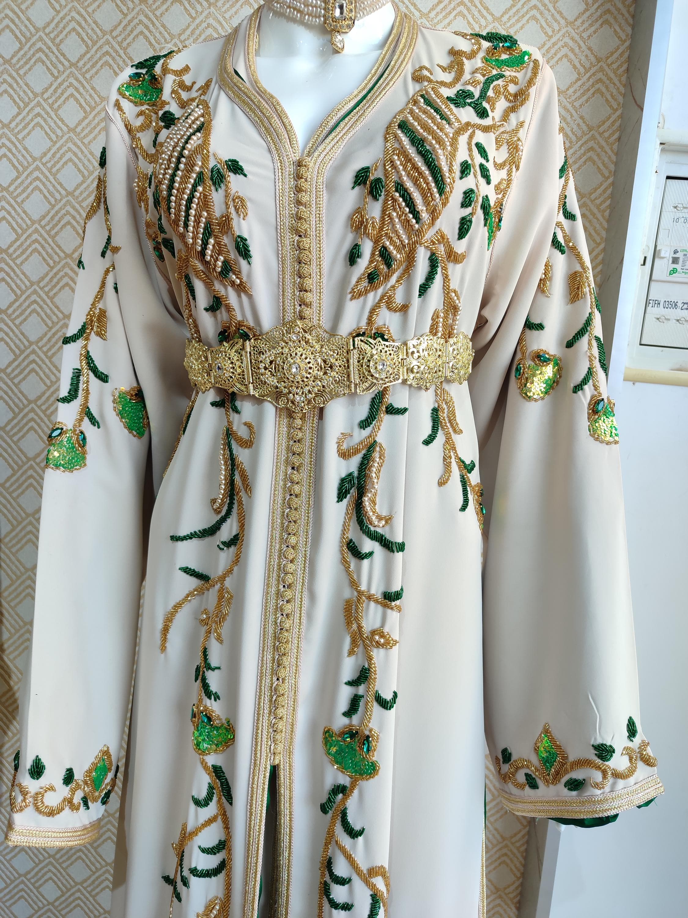 Inspired by heritage and tailored for the modern bride, this caftan marocain is a versatile option for a henna dress or muslim nikah dress. Detailed with fine embroidery and traditional cuts, it reflects the elegance of a palestinian dress while embracing the charm of a moroccan takchita. Ideal for cultural weddings and festive gatherings.