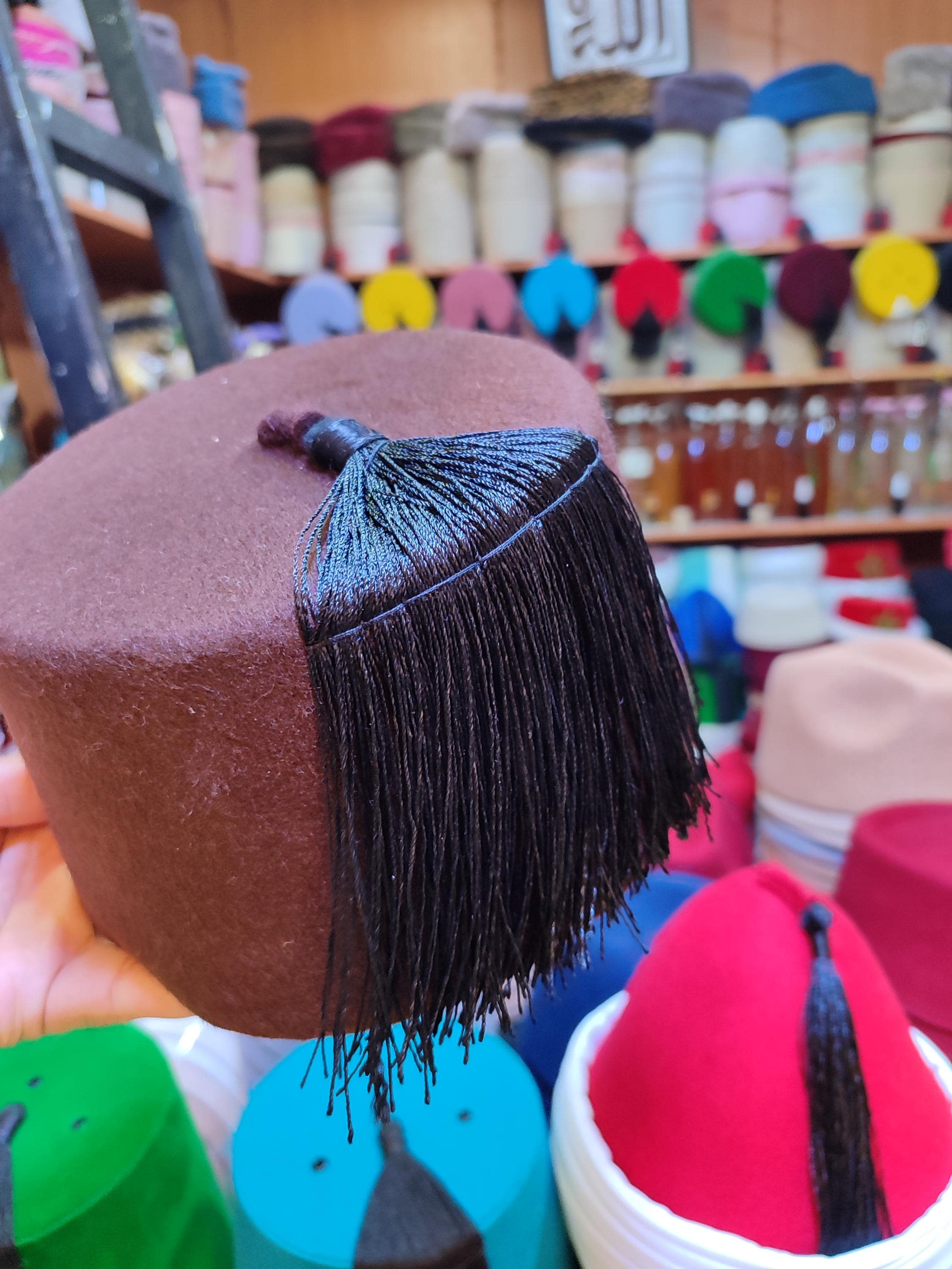 Discover the elegance of our handtailored velvet Fez hat. This particular style in a deep, sophisticated hue is crafted from soft brown velvet, offering both comfort and a premium appearance. The tarboosh fez design is instantly recognizable, making it a perfect conversation starter at festivals, cosplay events (like a Doctor Who hat), or cultural celebrations. As a handmade item, each hat has unique characteristics,