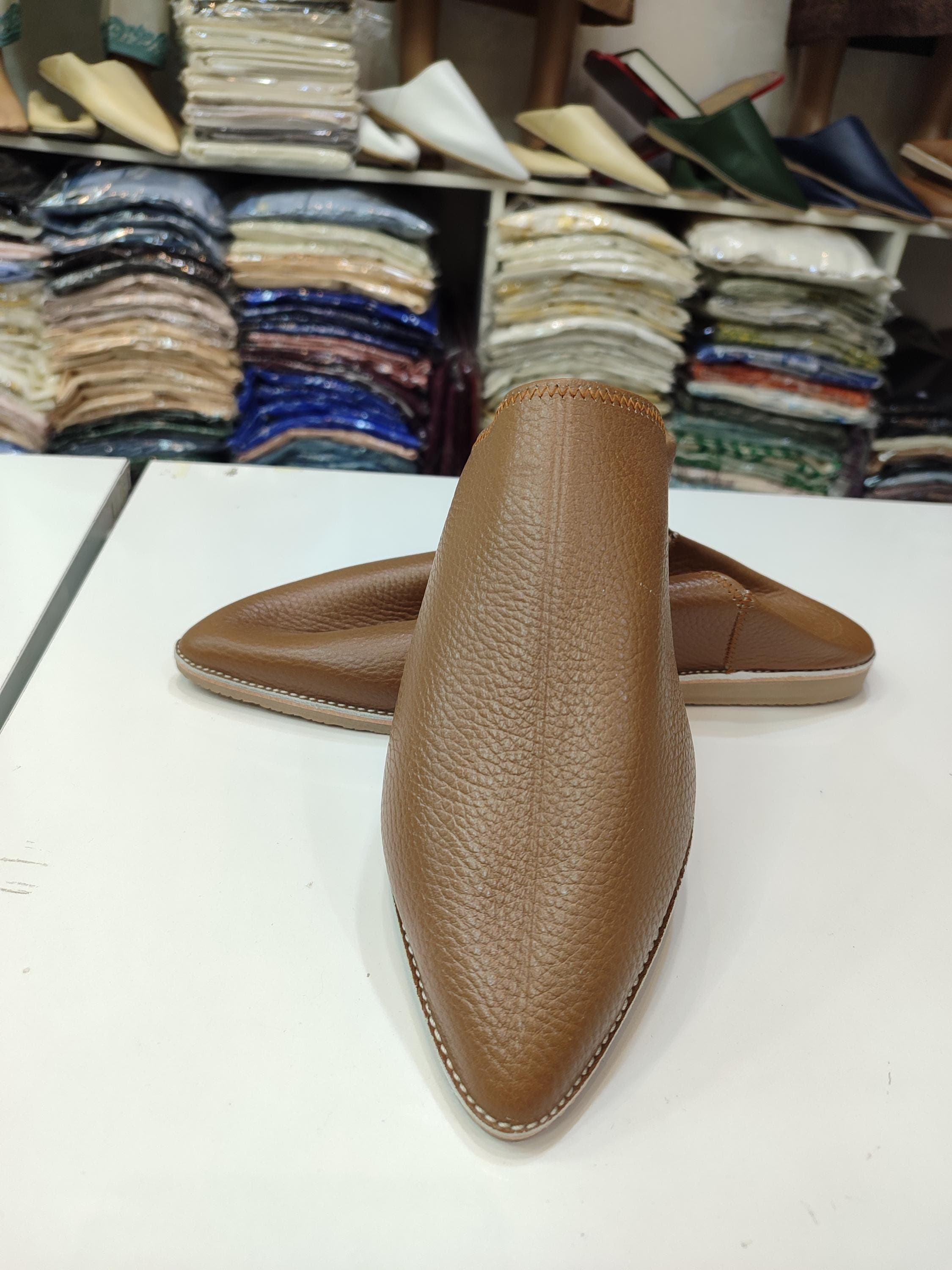 These authentic fez mules are specially designed to complement traditional attire, making them the perfect moroccan jalaba slippers for special occasions. Handcrafted in the spiritual capital of Morocco, these leather slippers men feature the classic pointed toe and soft leather construction that defines mens moroccan babouche style . The traditional moroccan slippers are made from organically tanned sheep leather, giving them a distinctive character that improves with wear