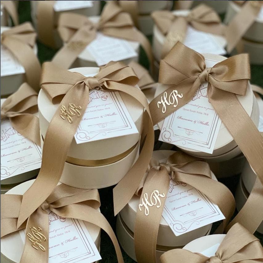 Beige and bronze wedding favor boxes with Silk Ribbon and Acrylic Initials.