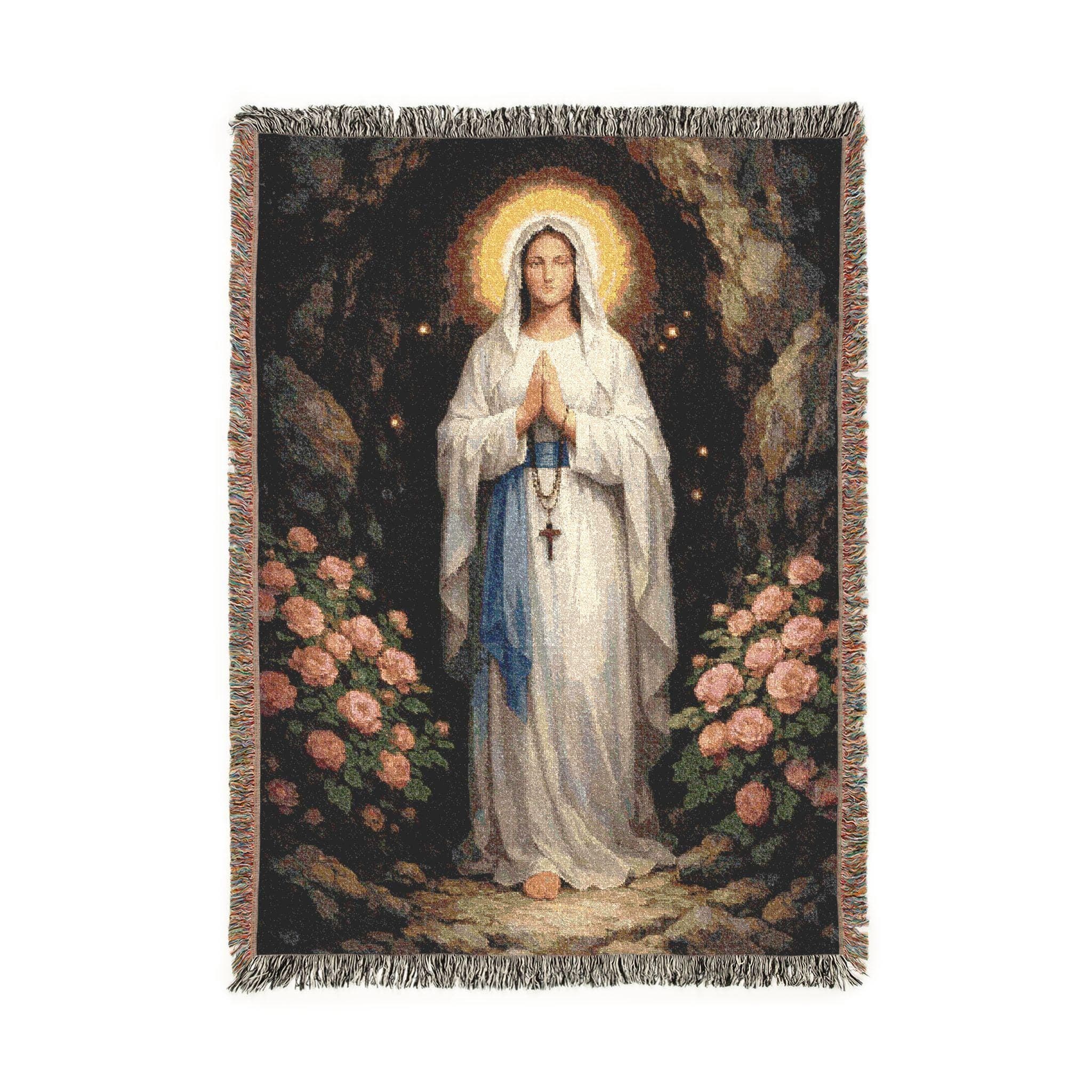 Woven tapestry wall hanging featuring Virgin Mary / Our Lady of Lourdes in a glowing halo, hands in prayer with rosary and cross, standing in a grotto cave framed by pink roses. Vintage Catholic decor with rich woven texture and fringe, perfect as prayer room wall hanging, church or chapel wall decor, serene bedroom or dorm blanket throw, devotional Christian wall art gift for Catholic mom, grandma, rosary lover, baptism, confirmation or housewarming.
