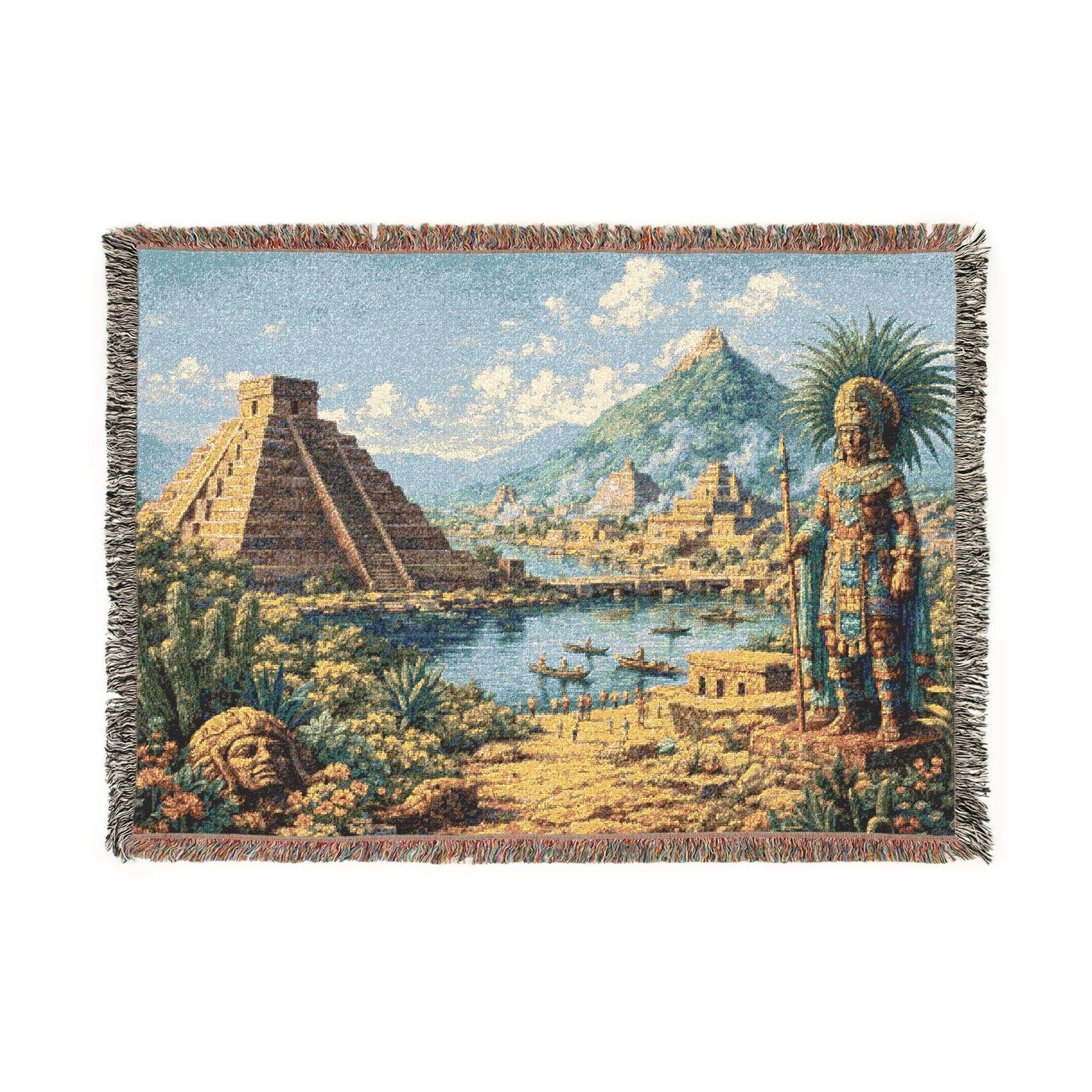 Woven tapestry wall hanging featuring an ancient Mesoamerican landscape with a stepped pyramid, ceremonial statue in feathered headdress, blue water, distant temples, mountain backdrop, desert plants and warm stone architecture under sky. Historic wall art with Aztec inspired, pre Columbian details, ideal as a large wall tapestry, woven throw blanket, cultural home decor, pyramid wall art, archaeology inspired gift, and statement piece for history lovers, travelers, and old world art collectors.