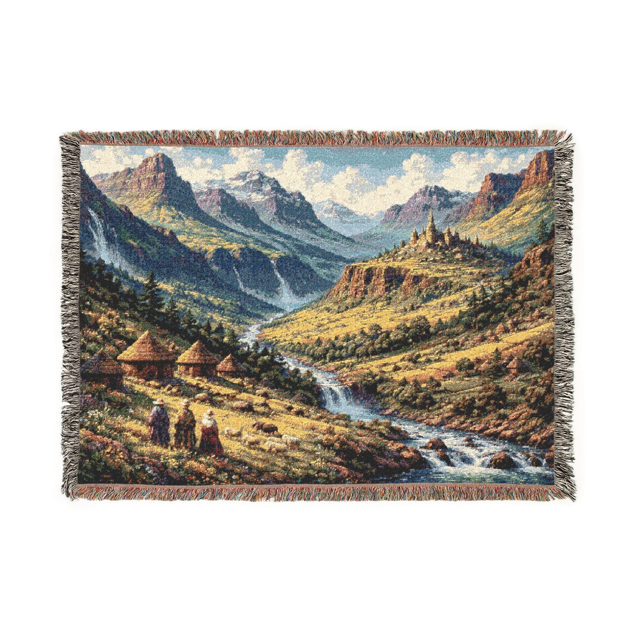 Woven tapestry wall hanging featuring a fantasy mountain valley with waterfalls, river, hillside huts, and a distant medieval castle under a bright sky. Scenic fantasy landscape decor with rich woven texture and fringe, ideal for bedroom, office, game room, reading nook, or study. Also works as a woven throw blanket. Perfect for castlecore decor, RPG room styling, medieval fantasy interiors, and gifts for fantasy lovers, readers, writers, and mountain landscape fans.