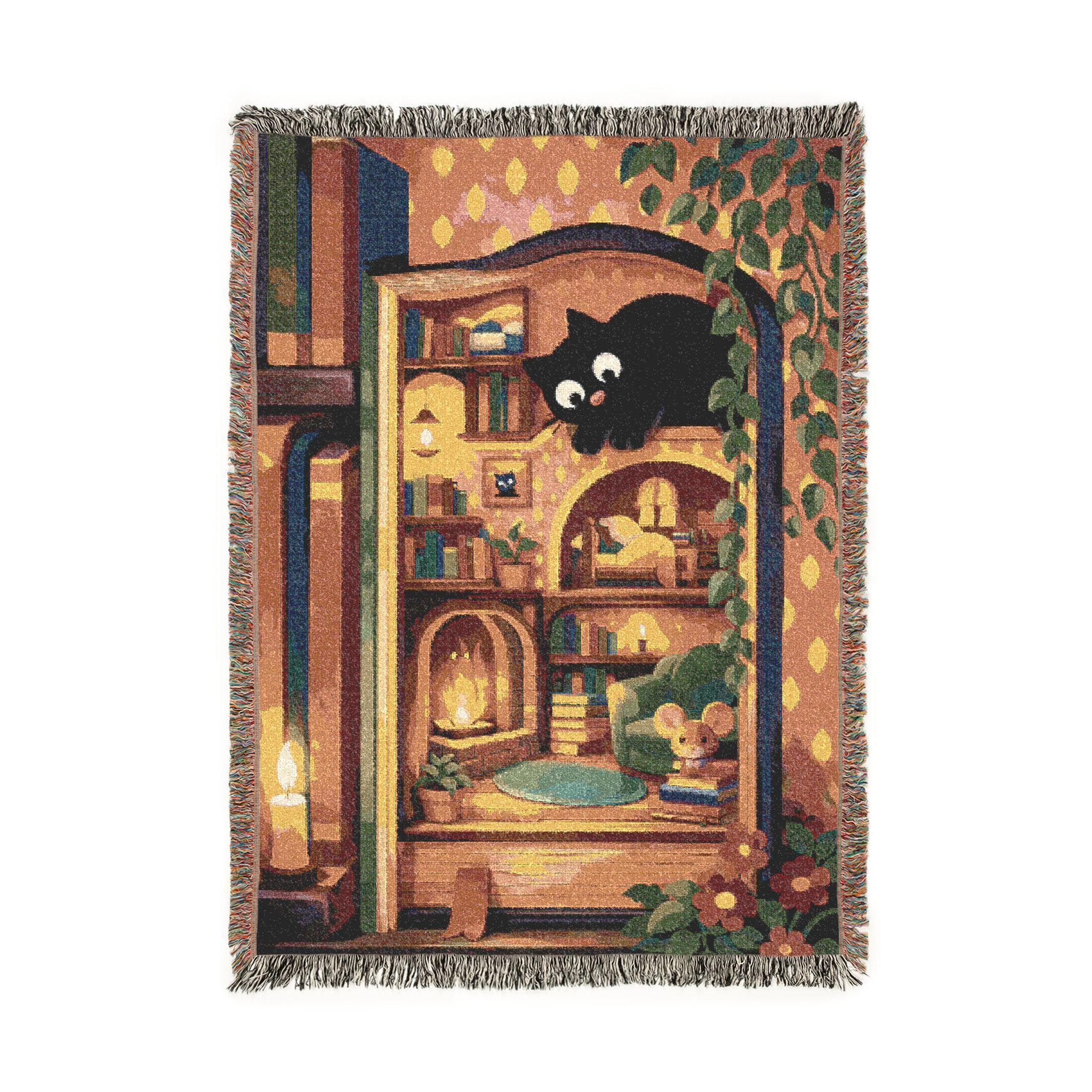 Woven tapestry wall hanging featuring a playful black cat resting above a tiny cozy dollhouse style reading nook with bookshelves, glowing fireplace, armchair, warm lamplight, trailing plants, flowers, and whimsical miniature room details. Cottagecore cat wall art with book lover decor, soft vintage color palette, and charming homey mood, ideal as a large wall tapestry, woven throw blanket, reading corner accent, cozy room decor, and gift for cat lovers, readers, and cottagecore home decor fans.