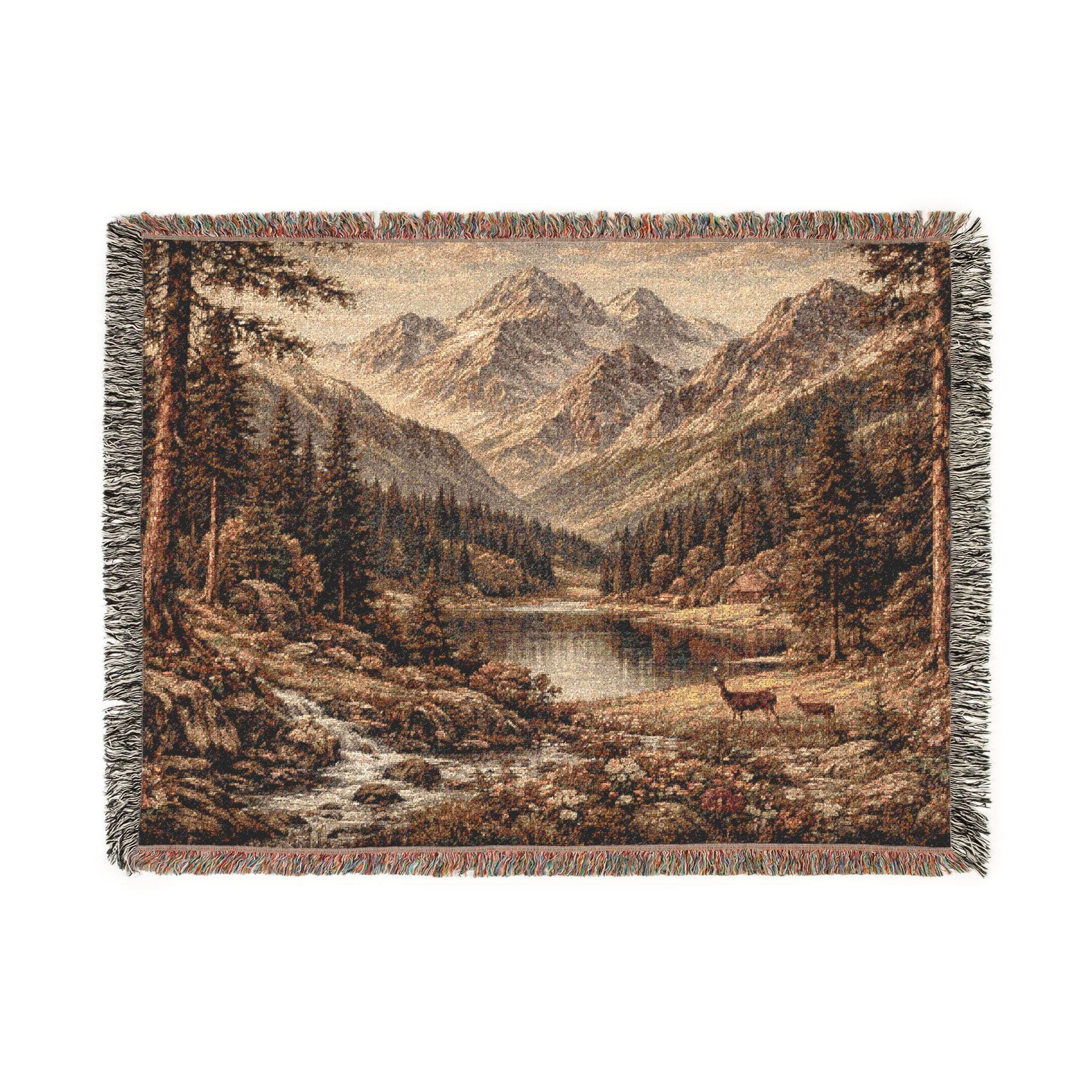 Woven tapestry blanket showing a vintage mountain landscape with an alpine lake in the center, evergreen forest on both sides, rocky stream in the foreground, and layered mountain peaks in the distance. Warm earthy tones and detailed woven texture with fringed edges. Works as tapestry wall art or woven wall hanging for cabin lodge decor, rustic home style, mountain house wall decor, and nature-inspired bedroom or living room accent. Great gift for outdoor lovers.