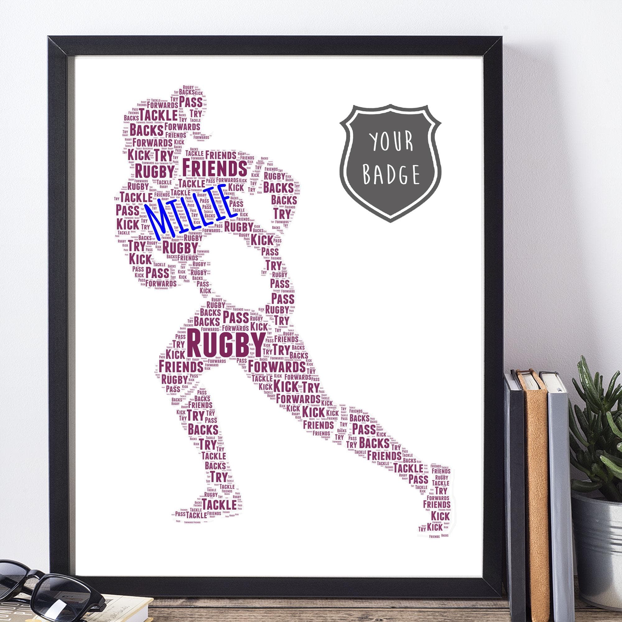A custom word art print featuring a silhouette of a female rugby player in action, running with a rugby ball. The figure is filled with colourful personalised typography, including names and rugby-themed words. The artwork is presented in high-quality wooden frames including Black Wood and Deep French Oak.